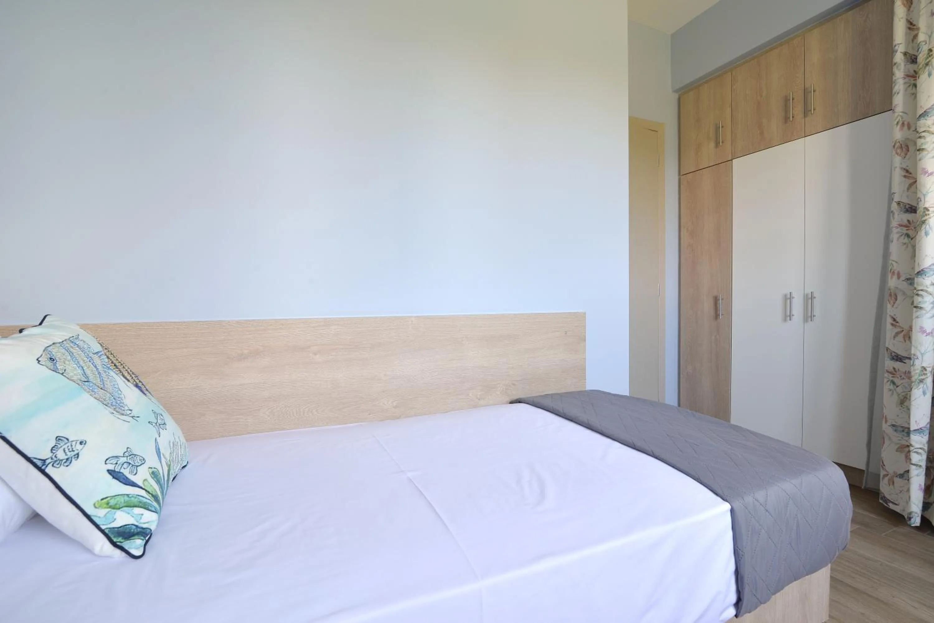 Bed in Niel Holiday Apartments, Panel Hospitality Homes & Villas