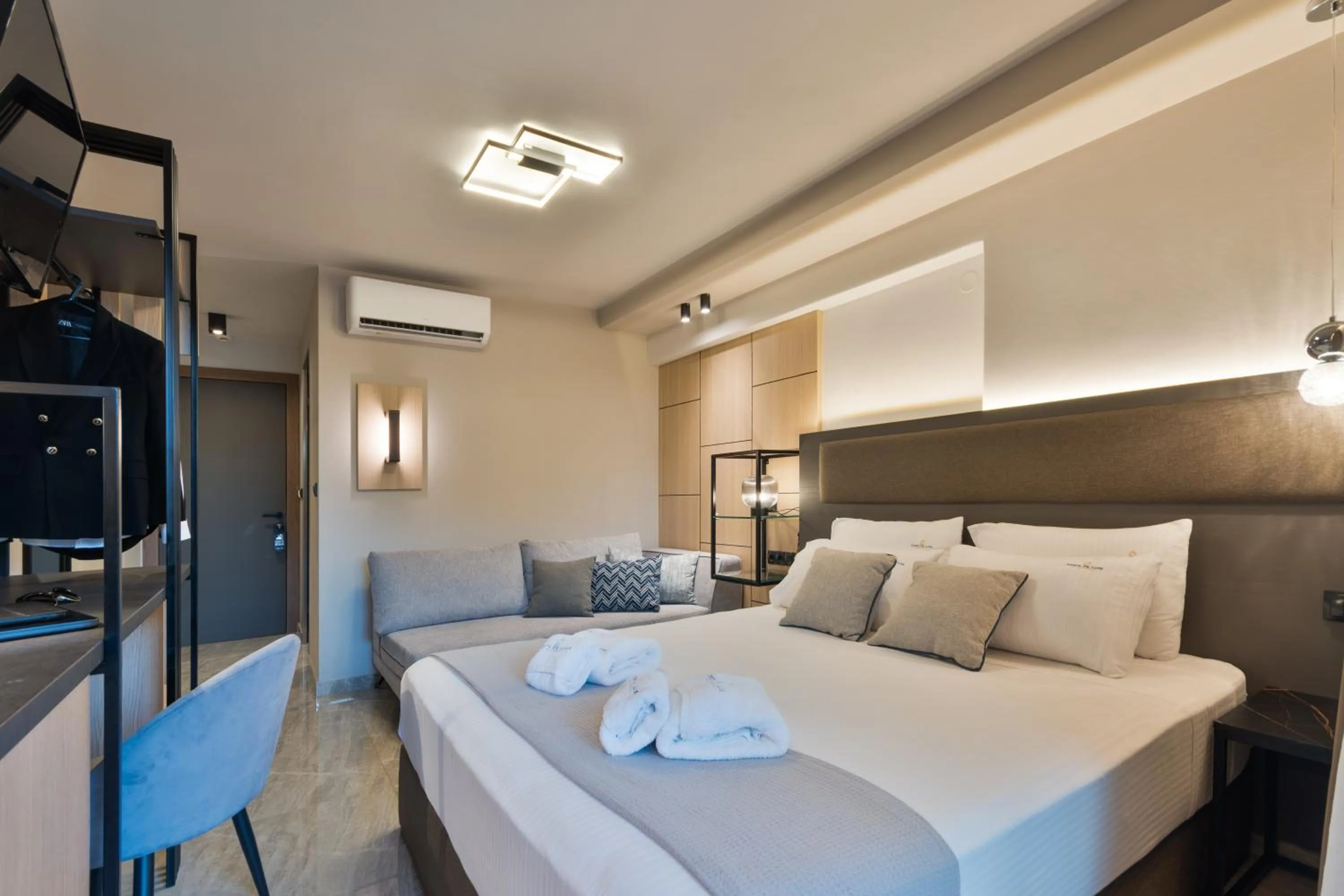 Bed in Costa De Luxe Suites