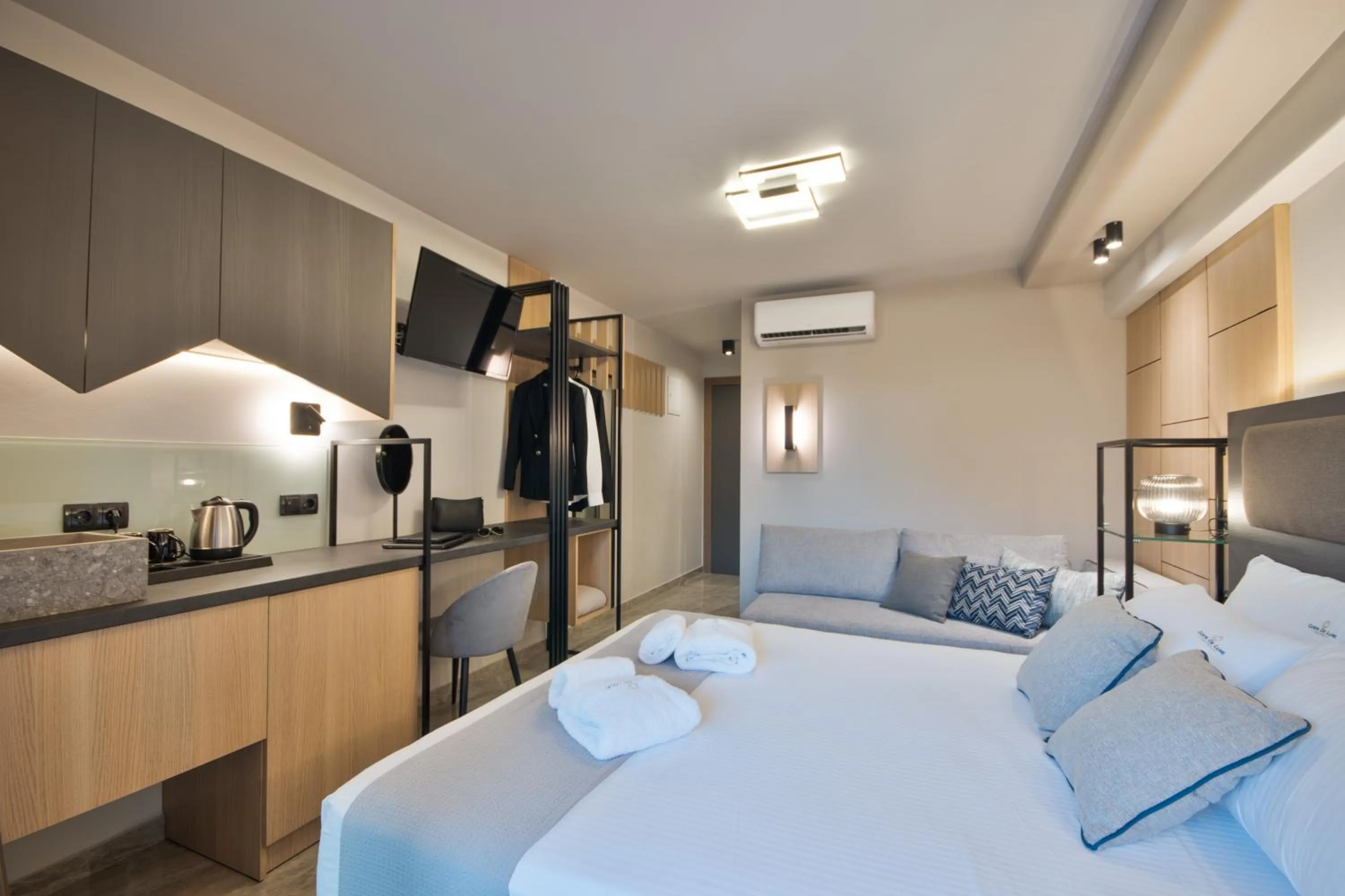 Bed in Costa De Luxe Suites