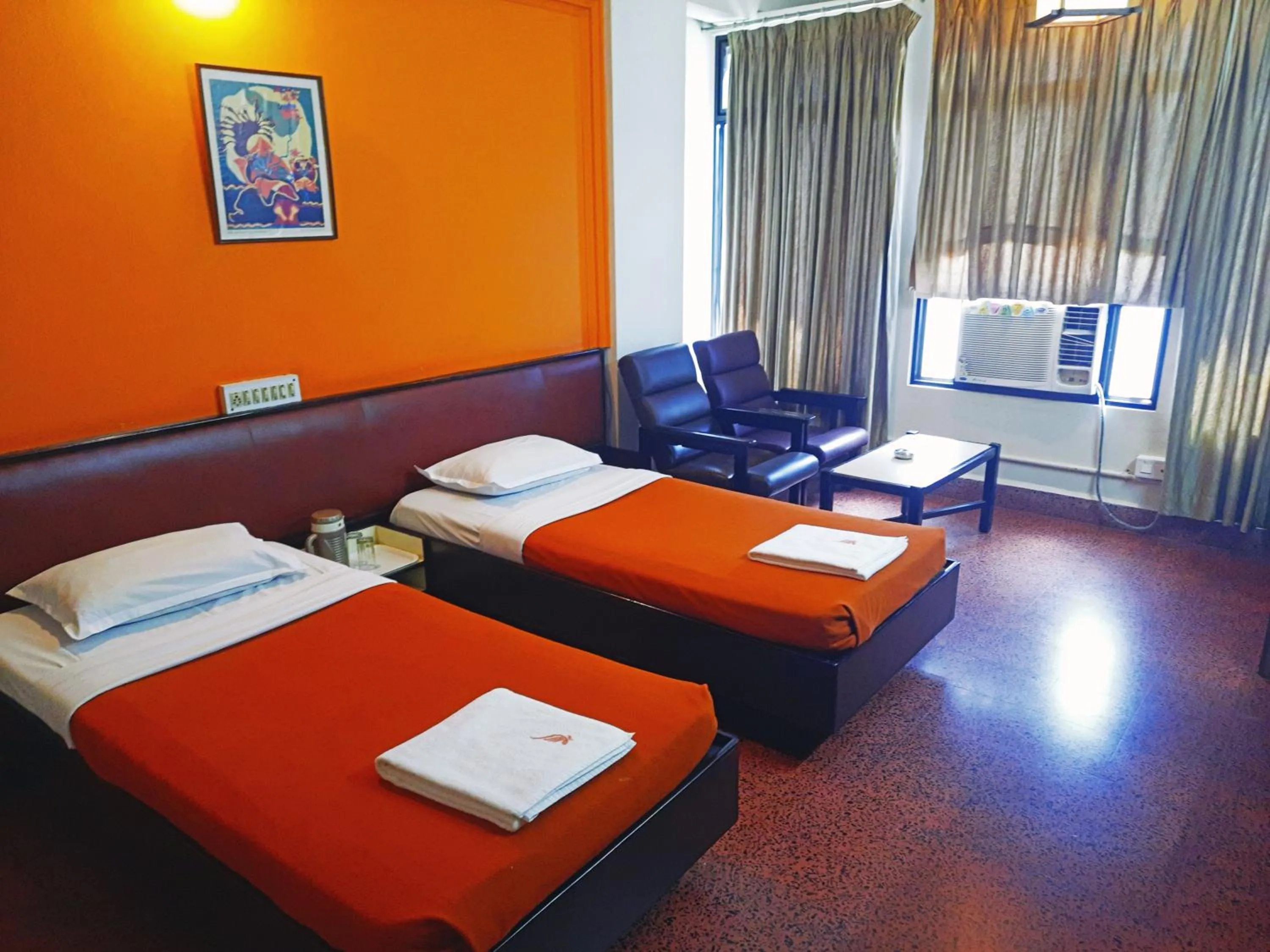 Bedroom in Sanman Deluxe Lodge