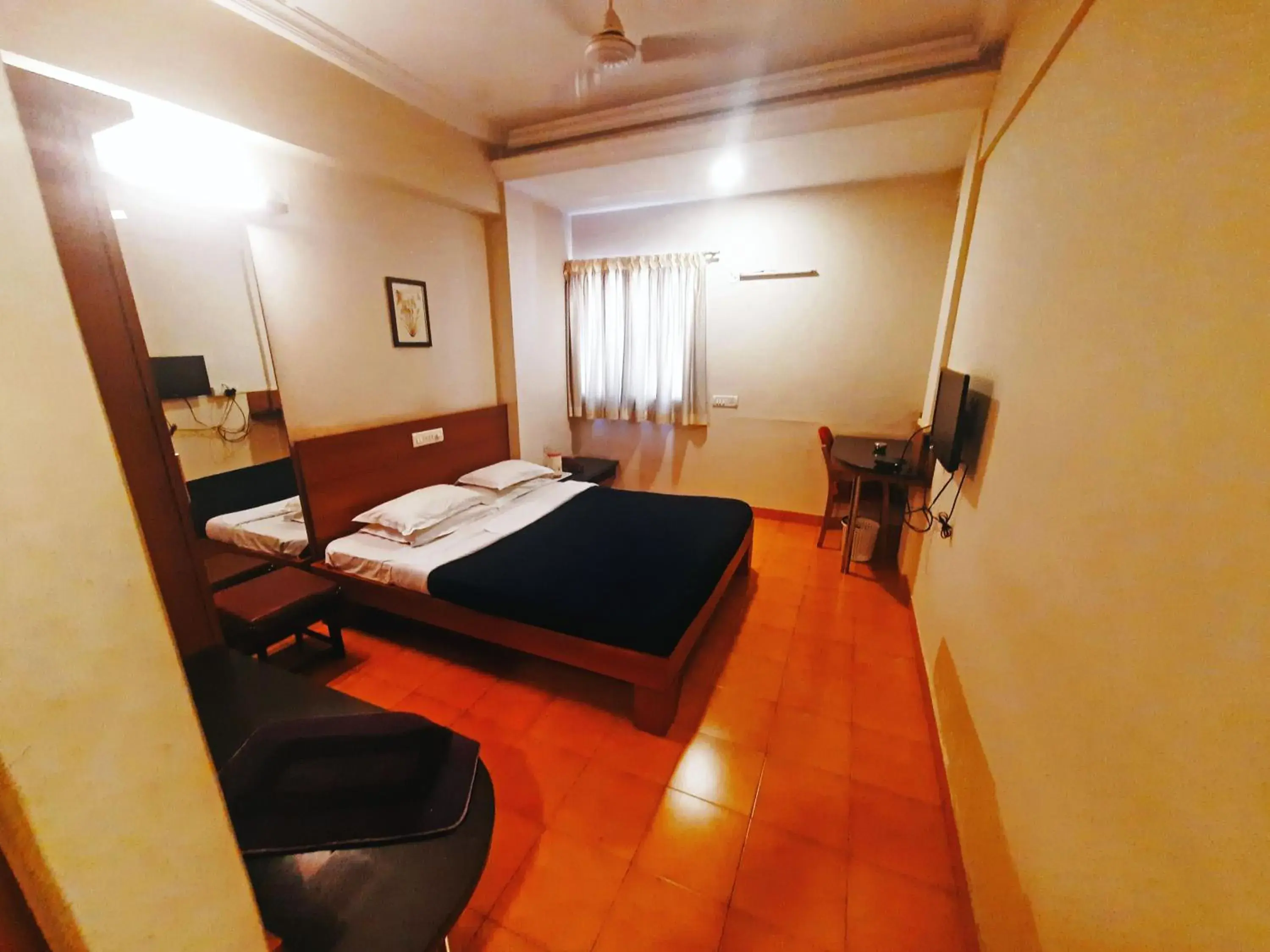 Bedroom in Sanman Deluxe Lodge Bedroom in Sanman Deluxe Lodge