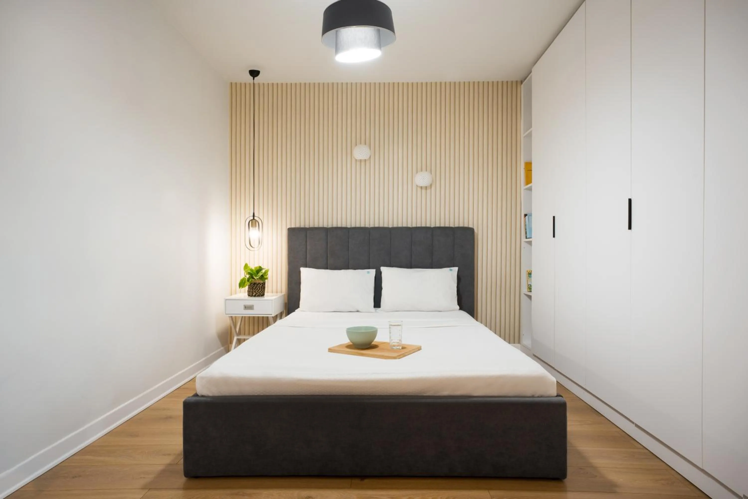 Bed in The Caravan Apartments