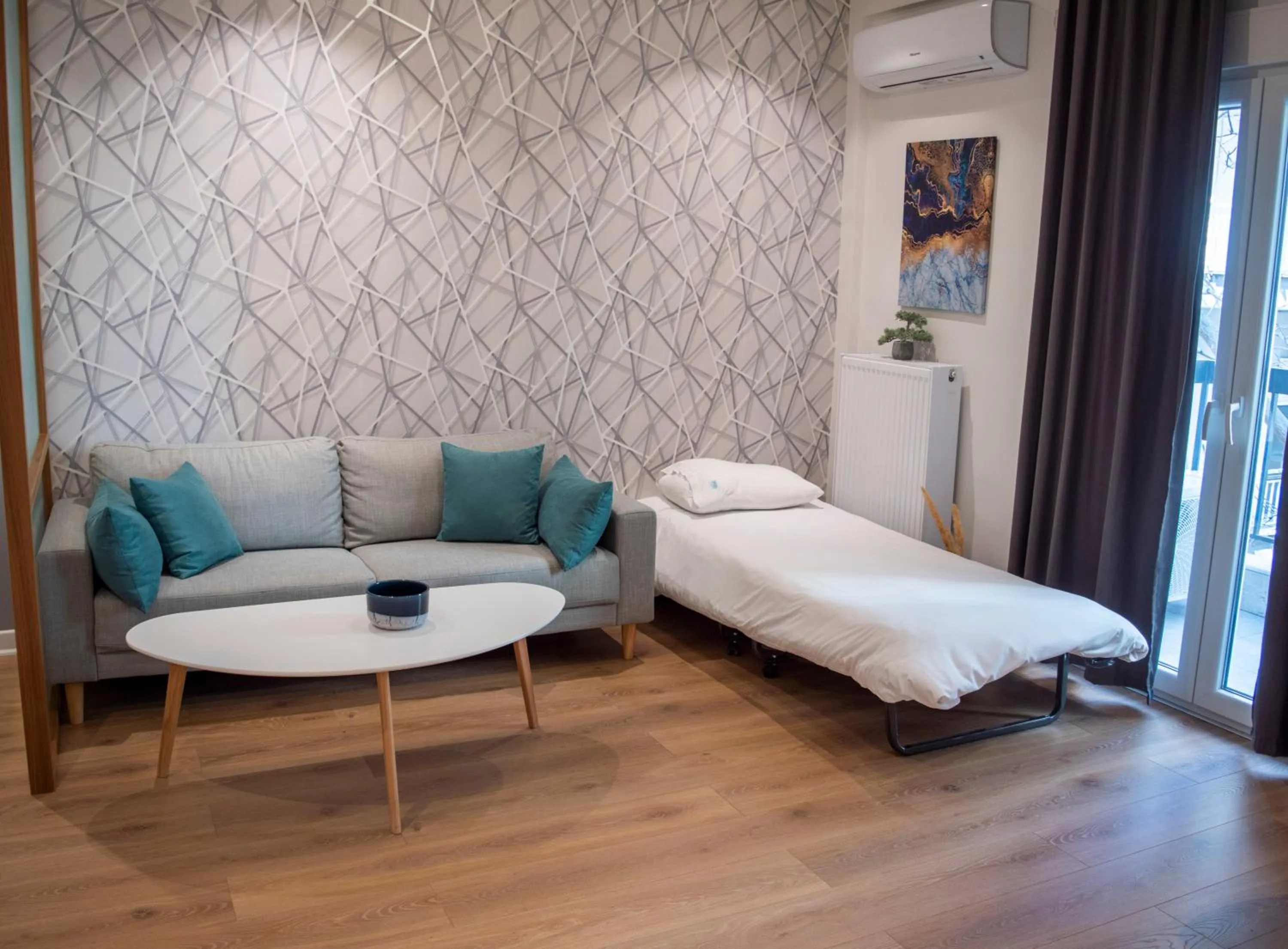 Living room, Bed in The Caravan Apartments