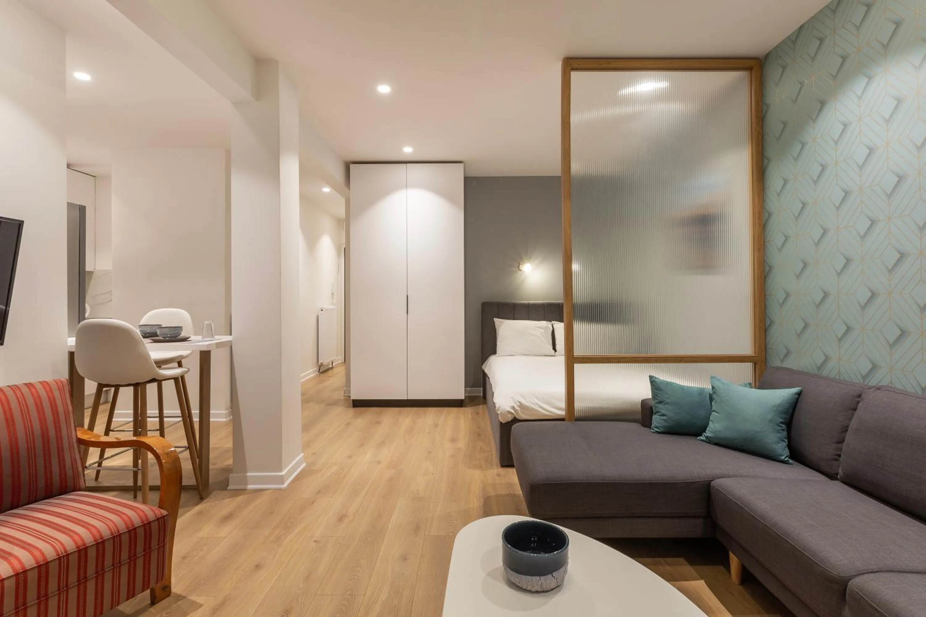 Bed in The Caravan Apartments