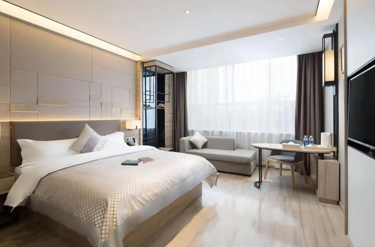 Bed in Morning Hotel, Wuhan Jinyin Lake Garden Expo Garden Yuya Yinhu City Bed in Morning Hotel, Wuhan Jinyin Lake Garden Expo Garden Yuya Yinhu City