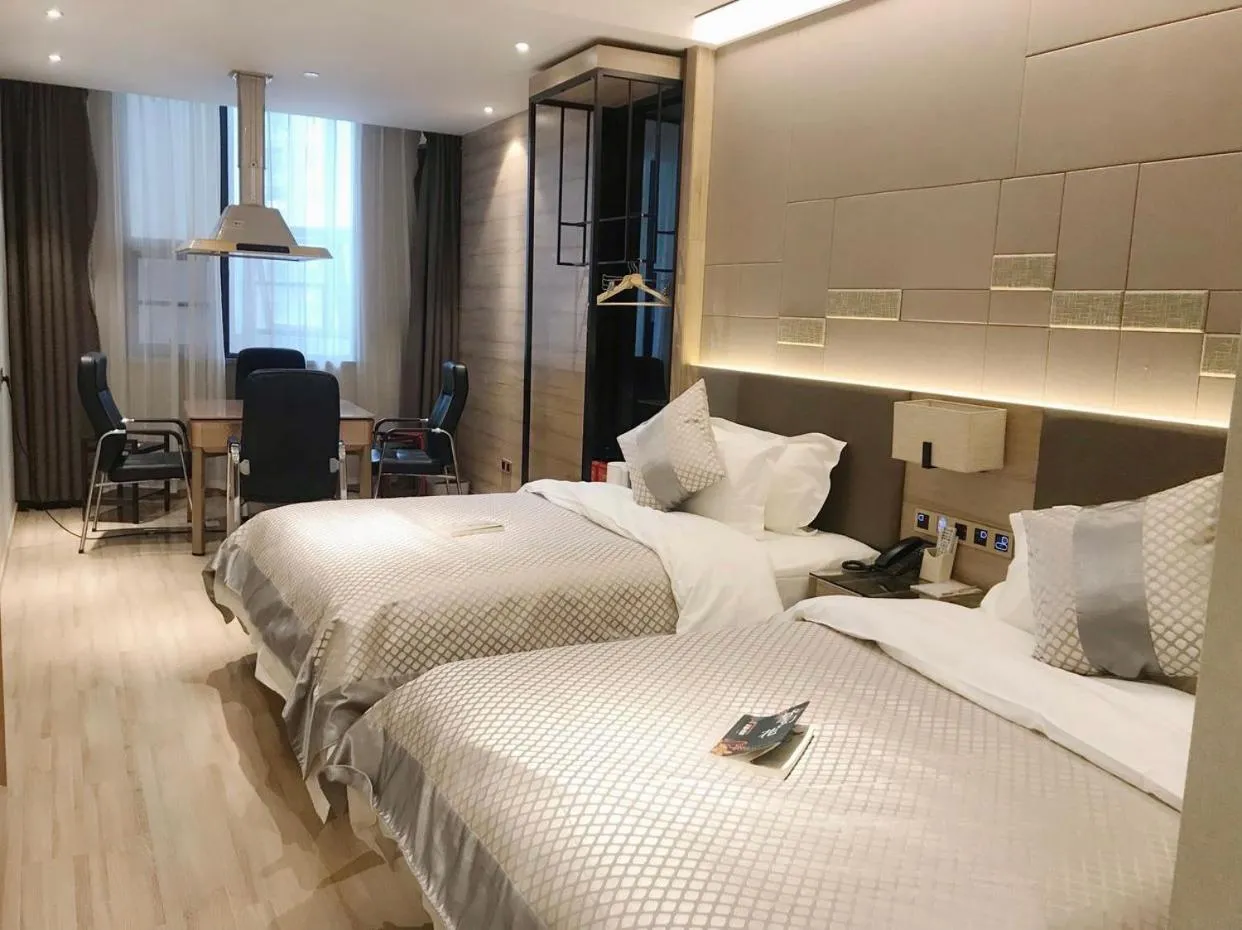 Bed in Morning Hotel, Wuhan Jinyin Lake Garden Expo Garden Yuya Yinhu City