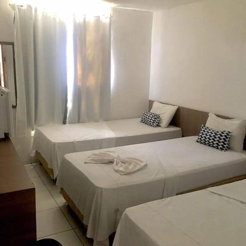 Bed in Jampa Mar Pousada