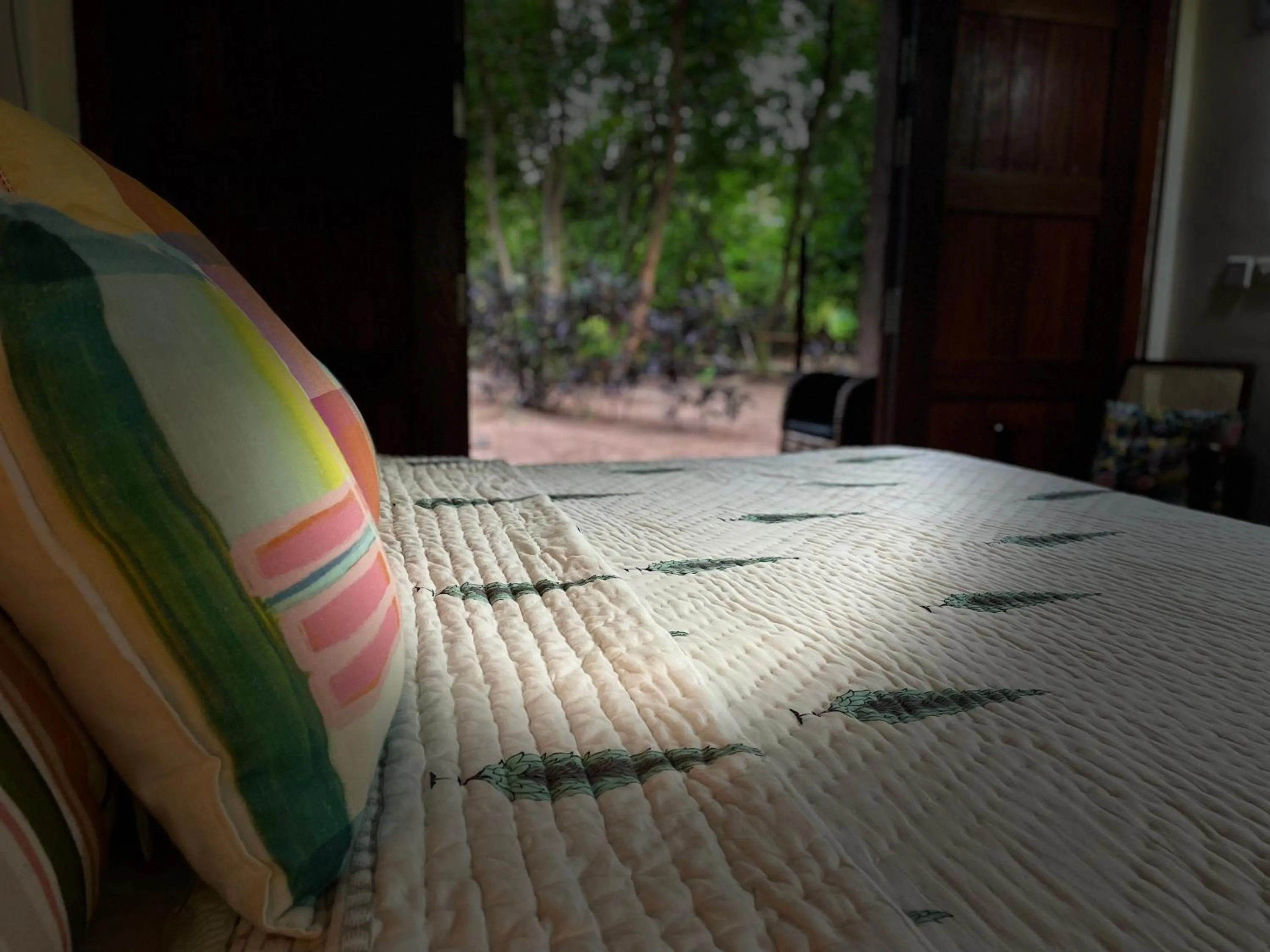 Bed in The DIVEResort and Dancing Dugong Cafe