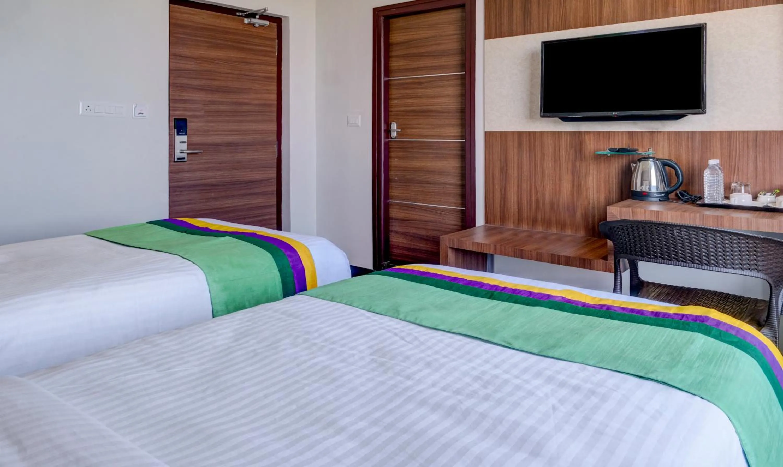 Bedroom, Bed in Treebo Rushi Grand