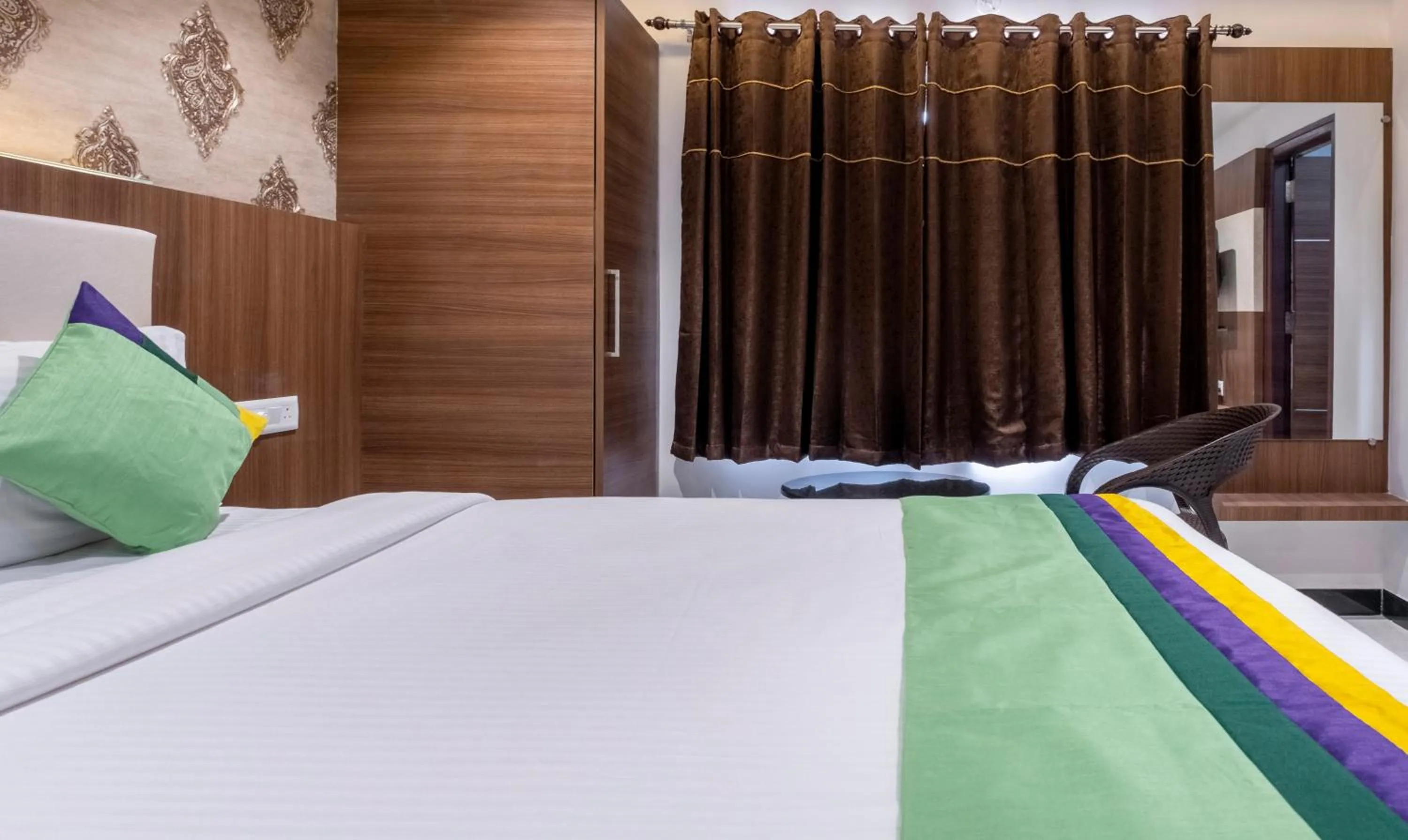 Bedroom, Bed in Treebo Rushi Grand