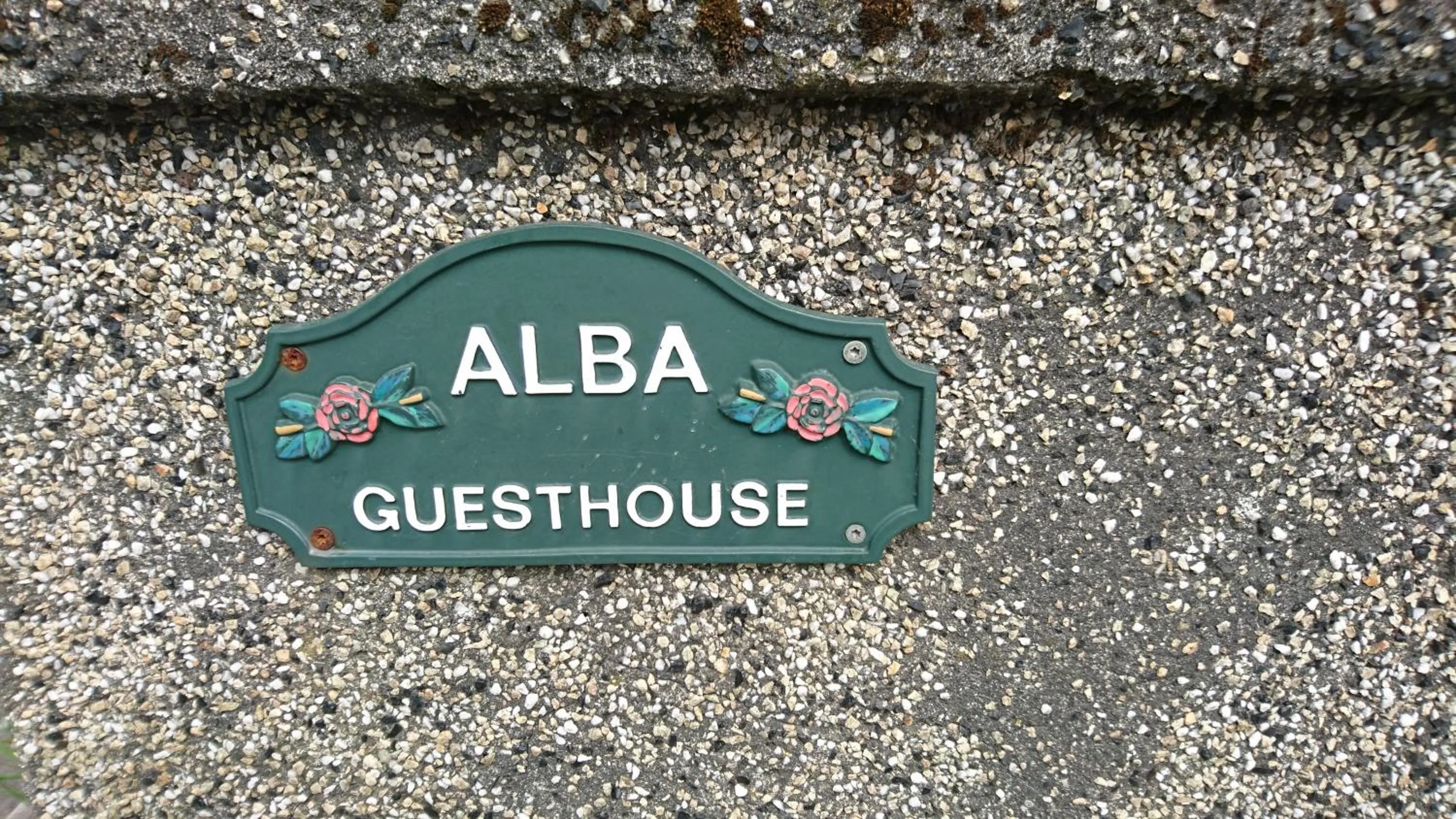 Property logo or sign in Alba Guesthouse