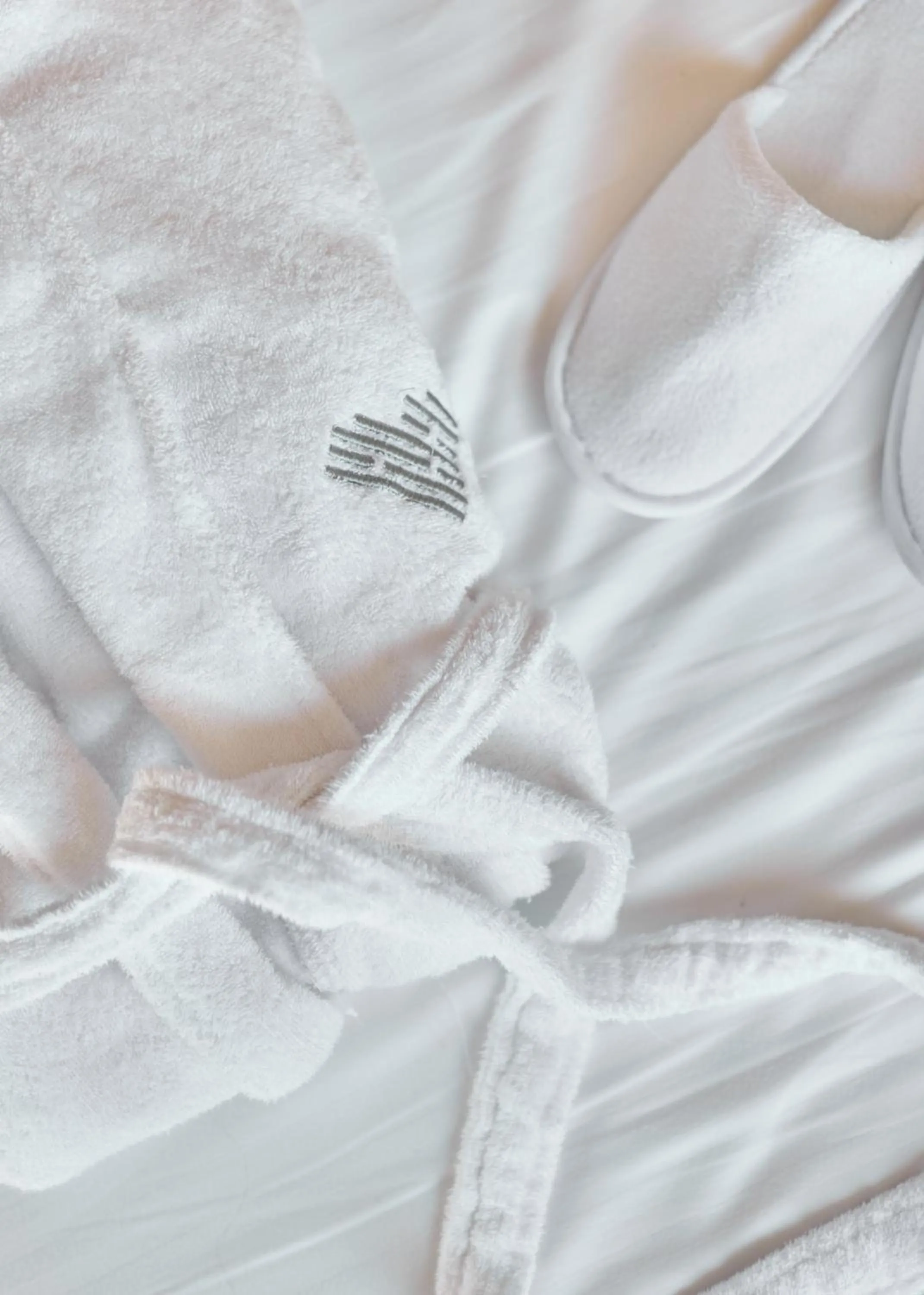 towels, Bed in Heart Hotel