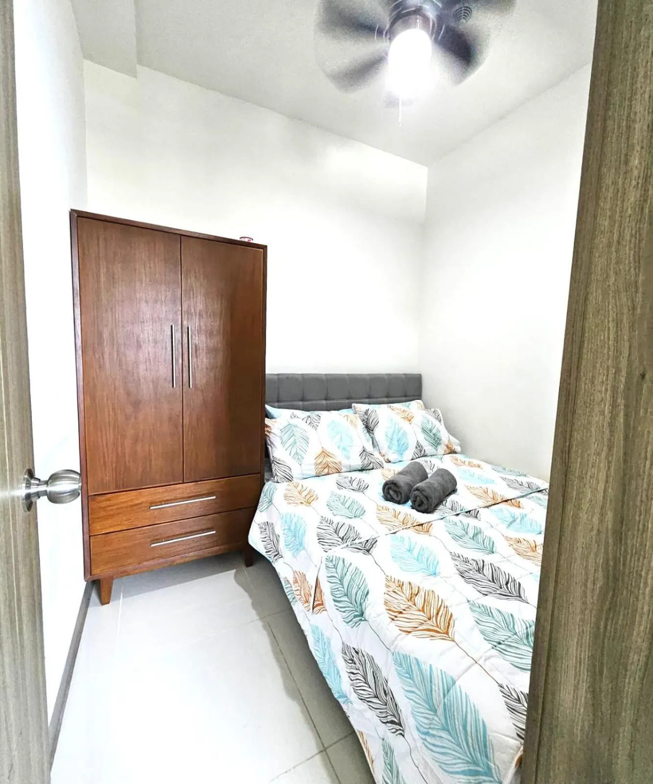 Bed in Coast Residences - 2 Bedroom with Balcony facing Mall of Asia, Manila Bay & Pool View