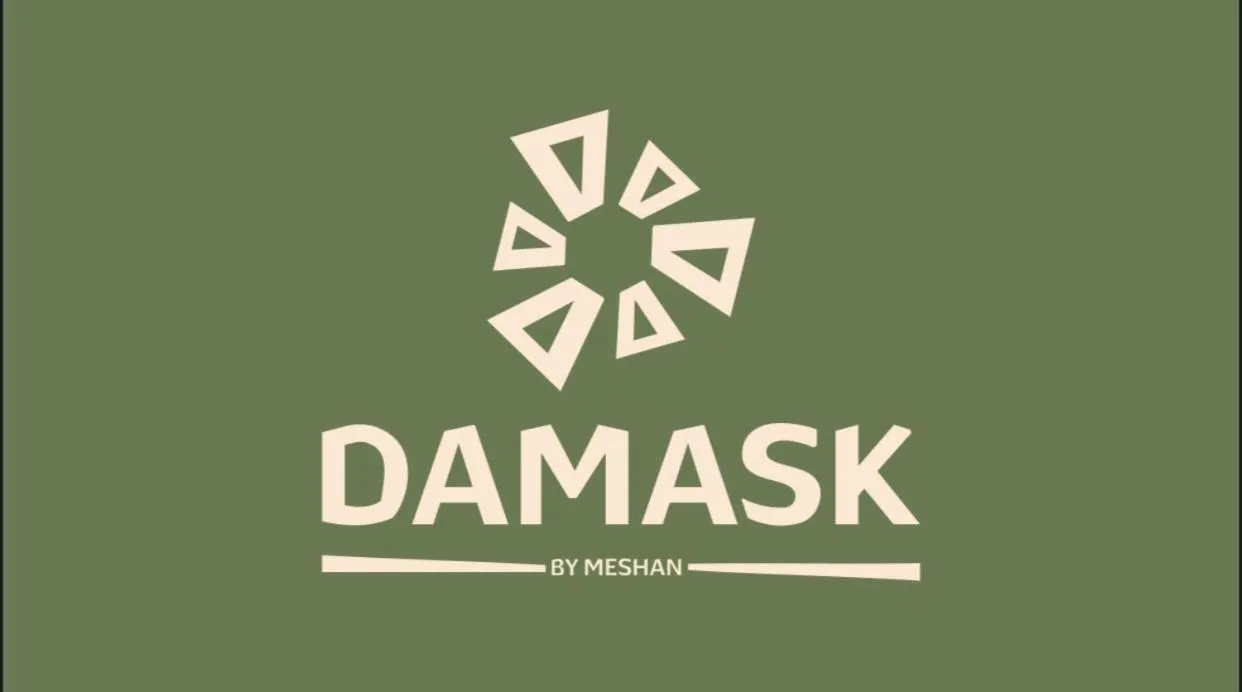 Property logo or sign in Damask Resort