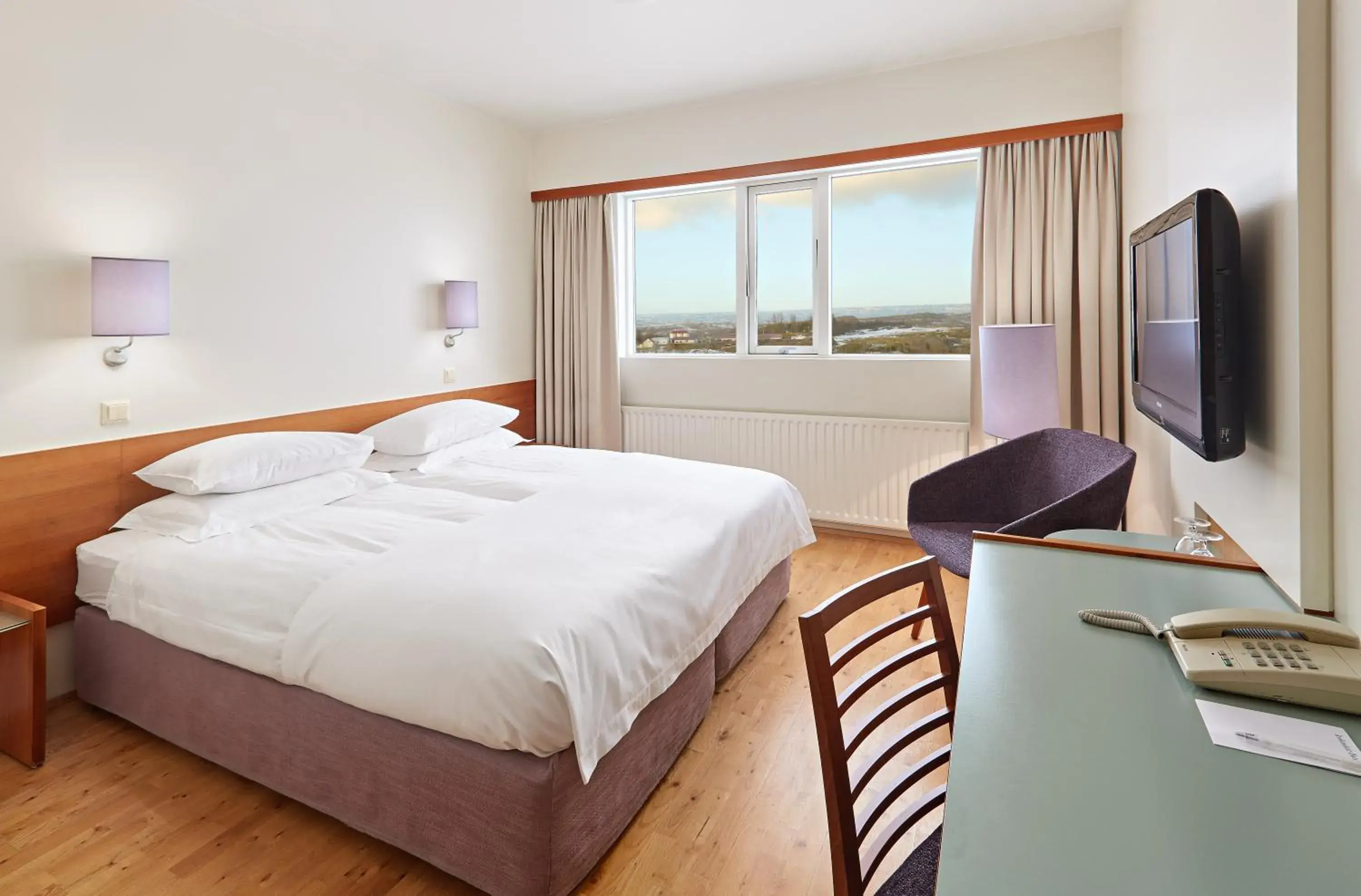 Photo of the whole room, Bed in Hérað - Berjaya Iceland Hotels Photo of the whole room, Bed in Hérað - Berjaya Iceland Hotels