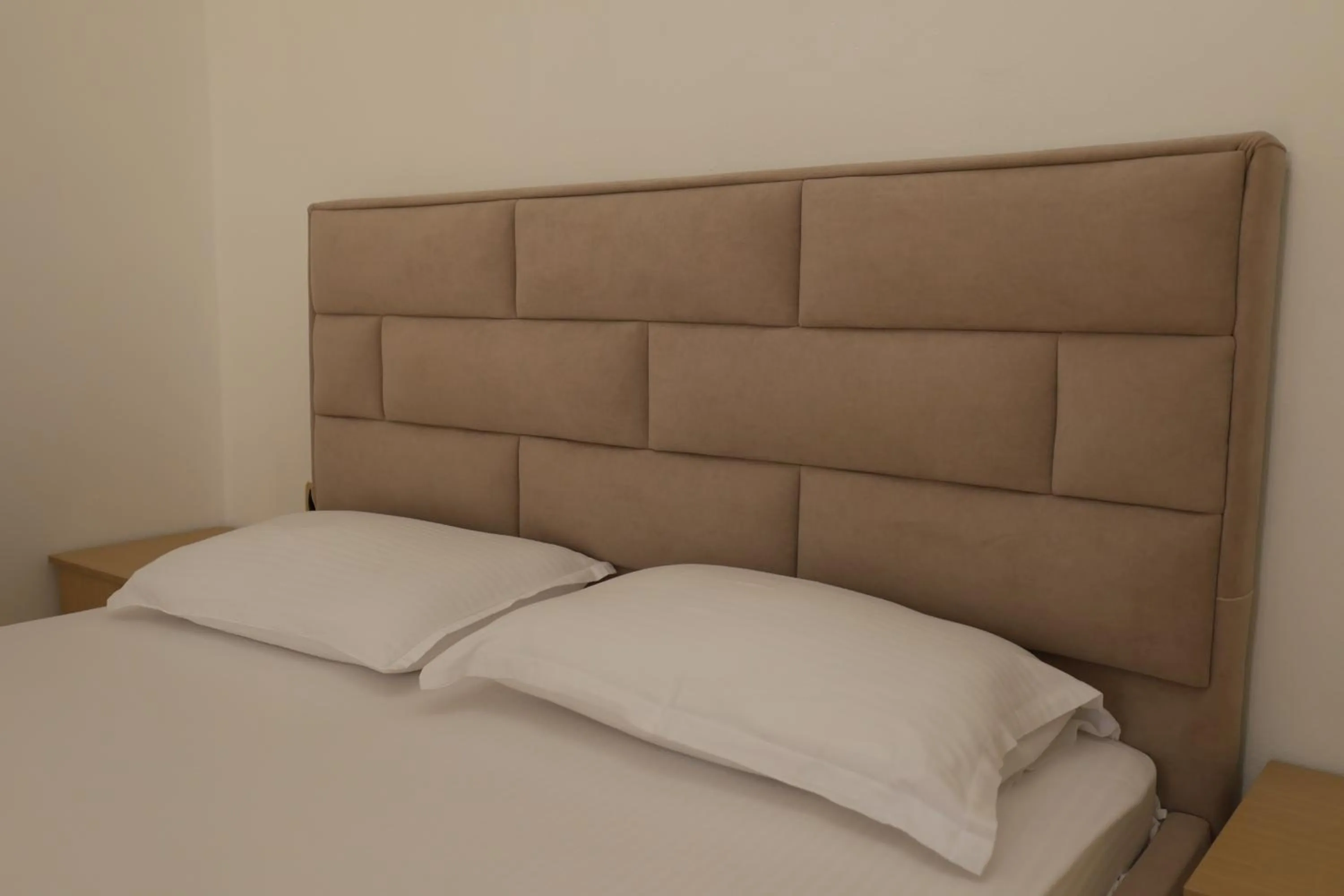 Bed in Michelle Apartments