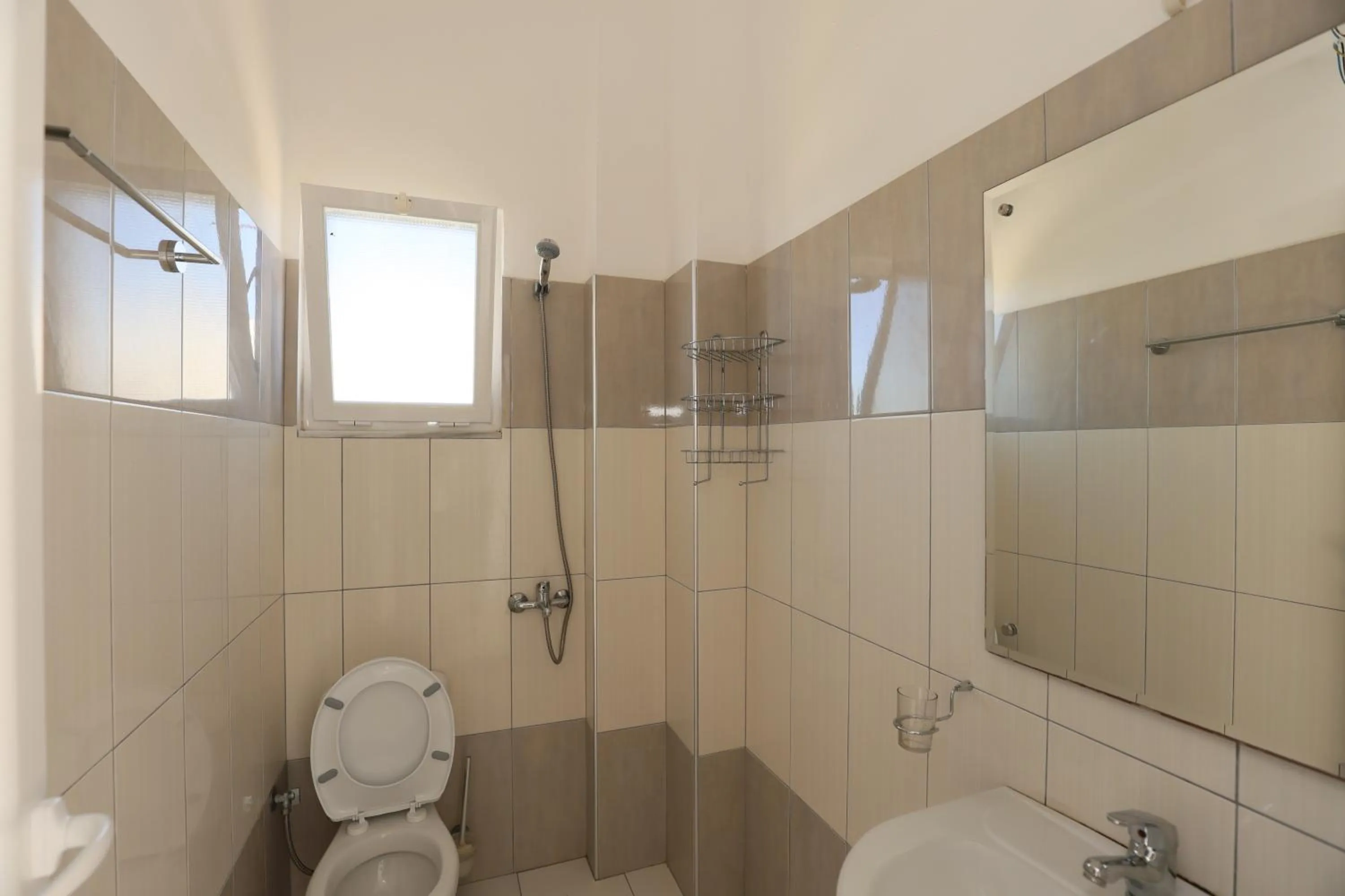 Toilet in Michelle Apartments