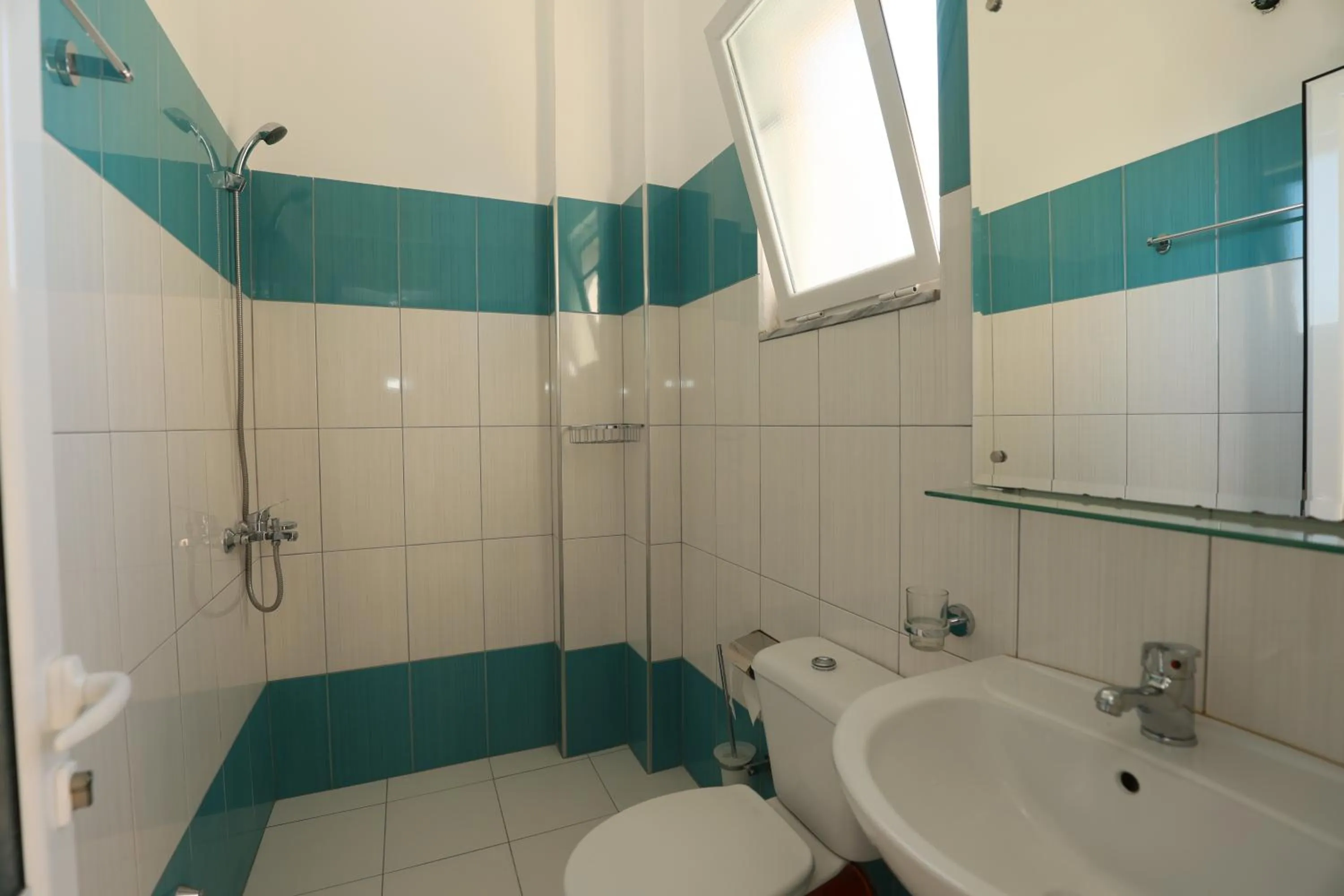 Toilet in Michelle Apartments