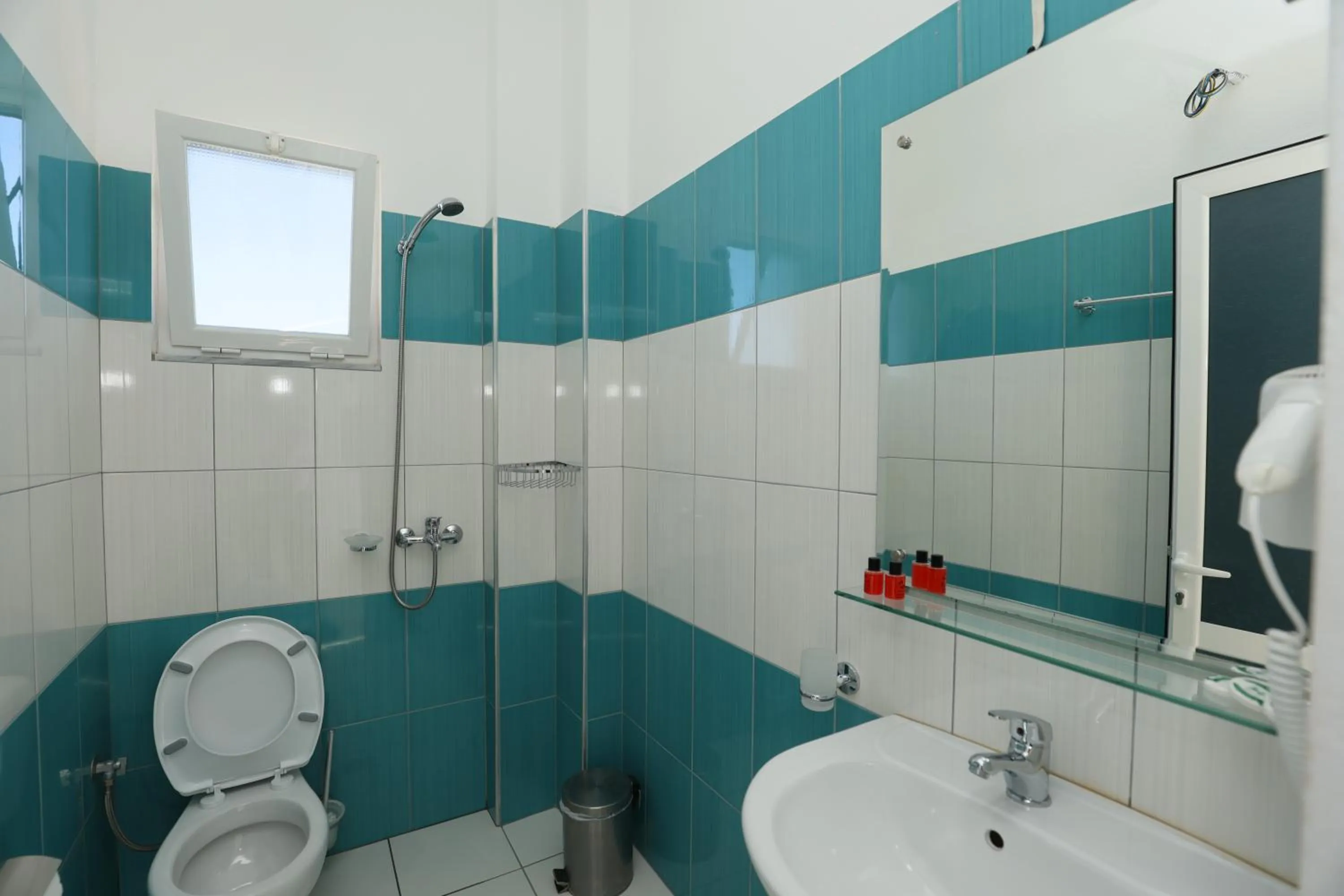 Toilet in Michelle Apartments