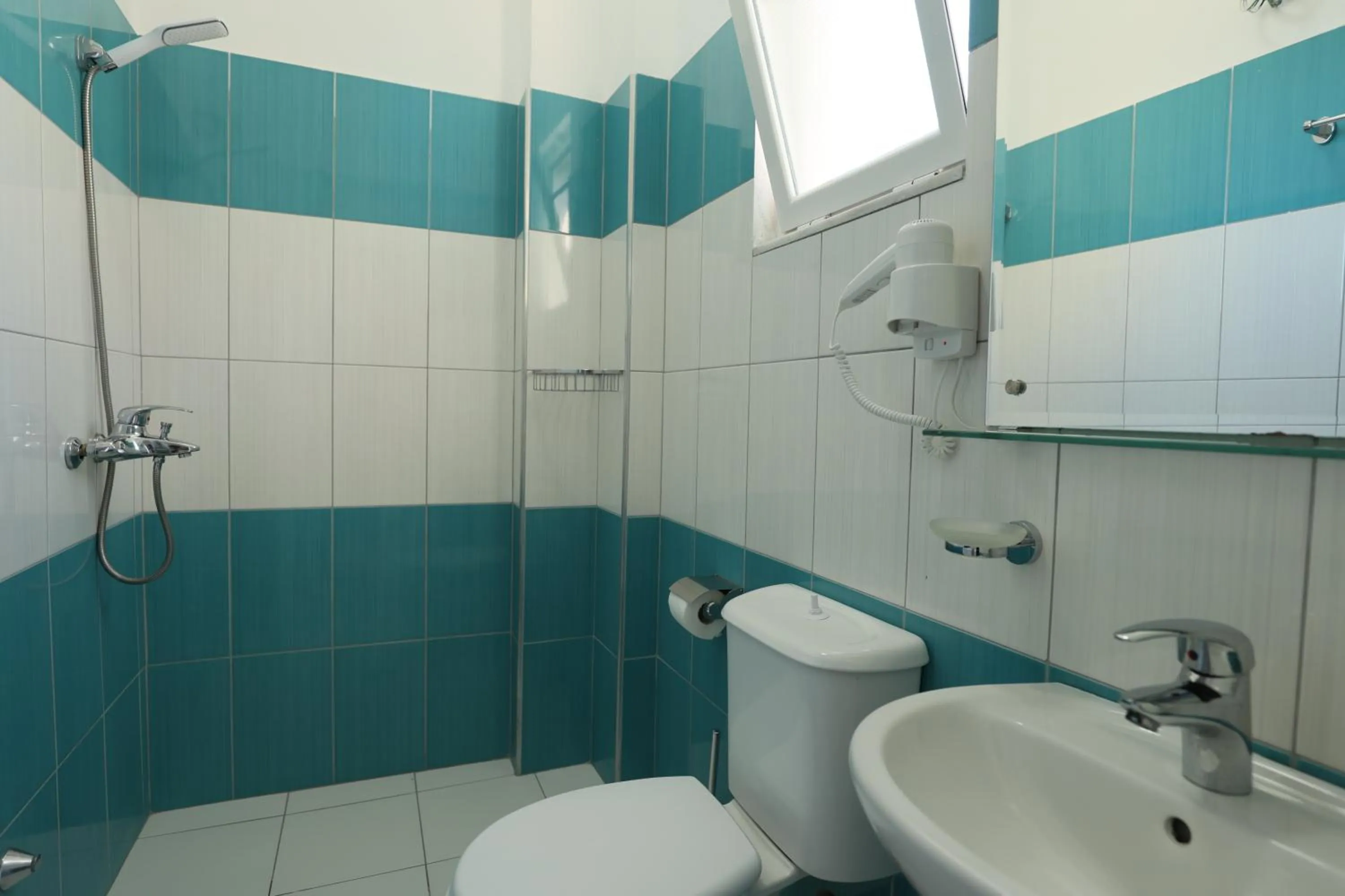 Toilet in Michelle Apartments