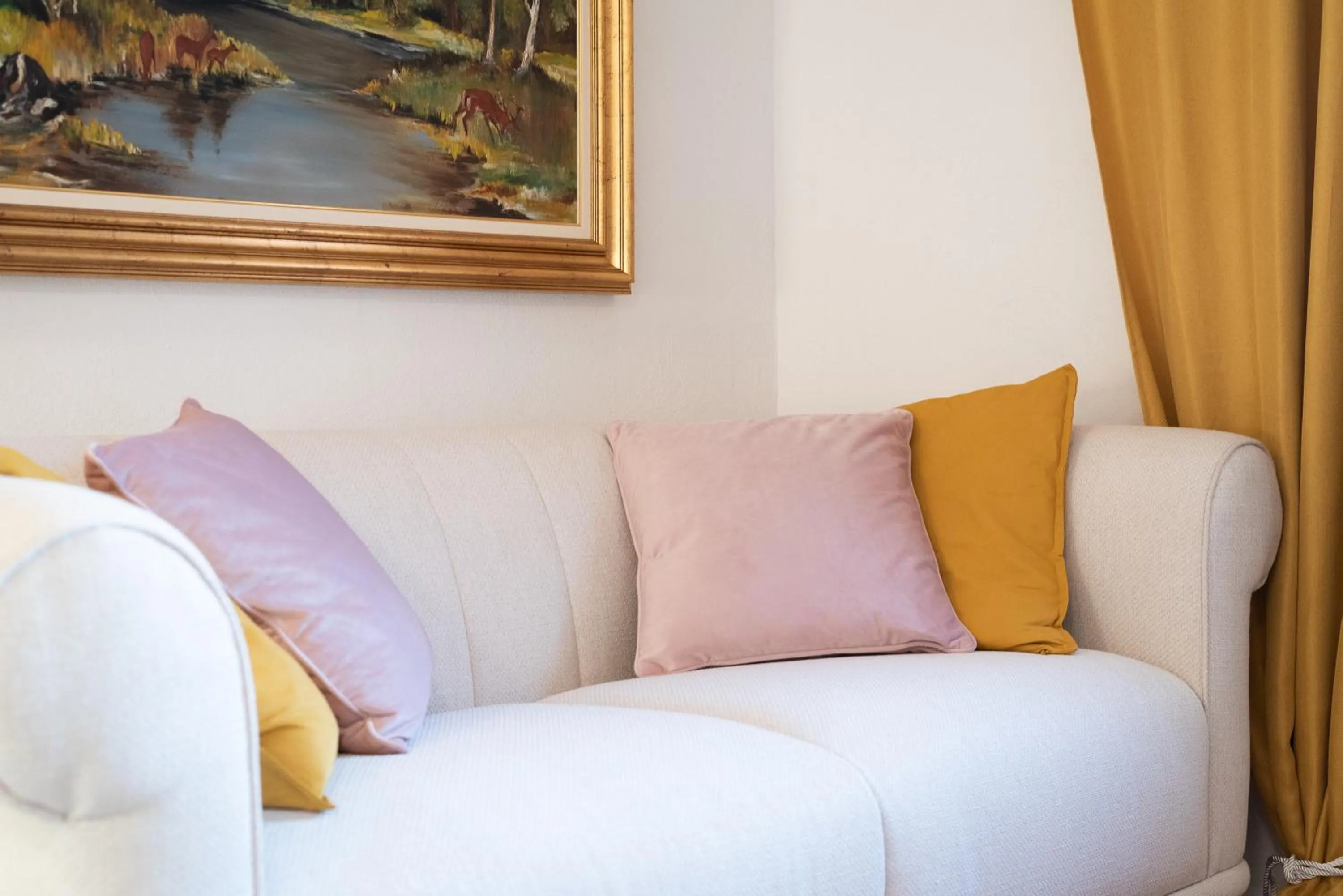 Seating area, Bed in Selamare Apartment by Locap Group