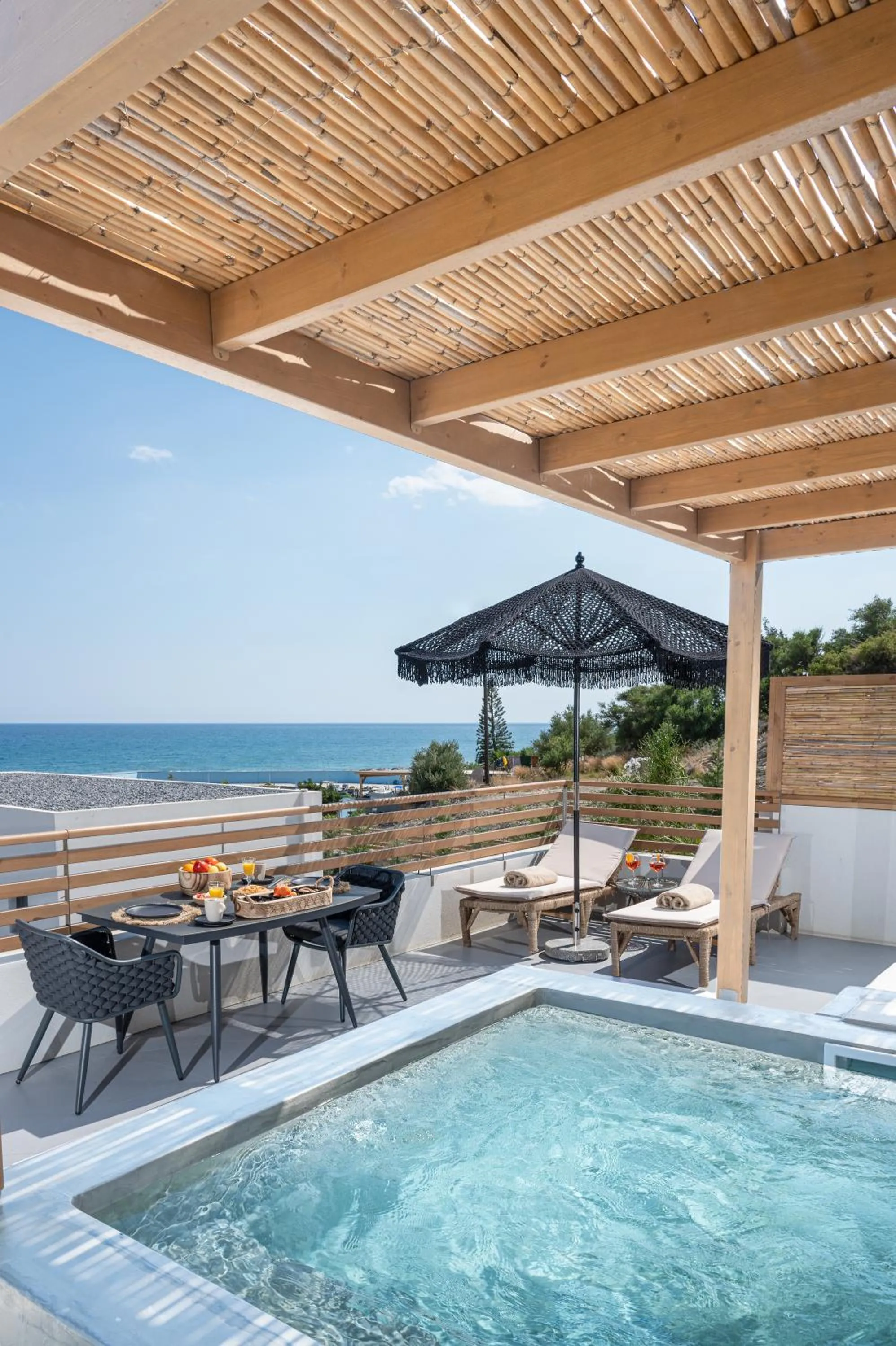 Patio in Mnḗmē Suites & Villas