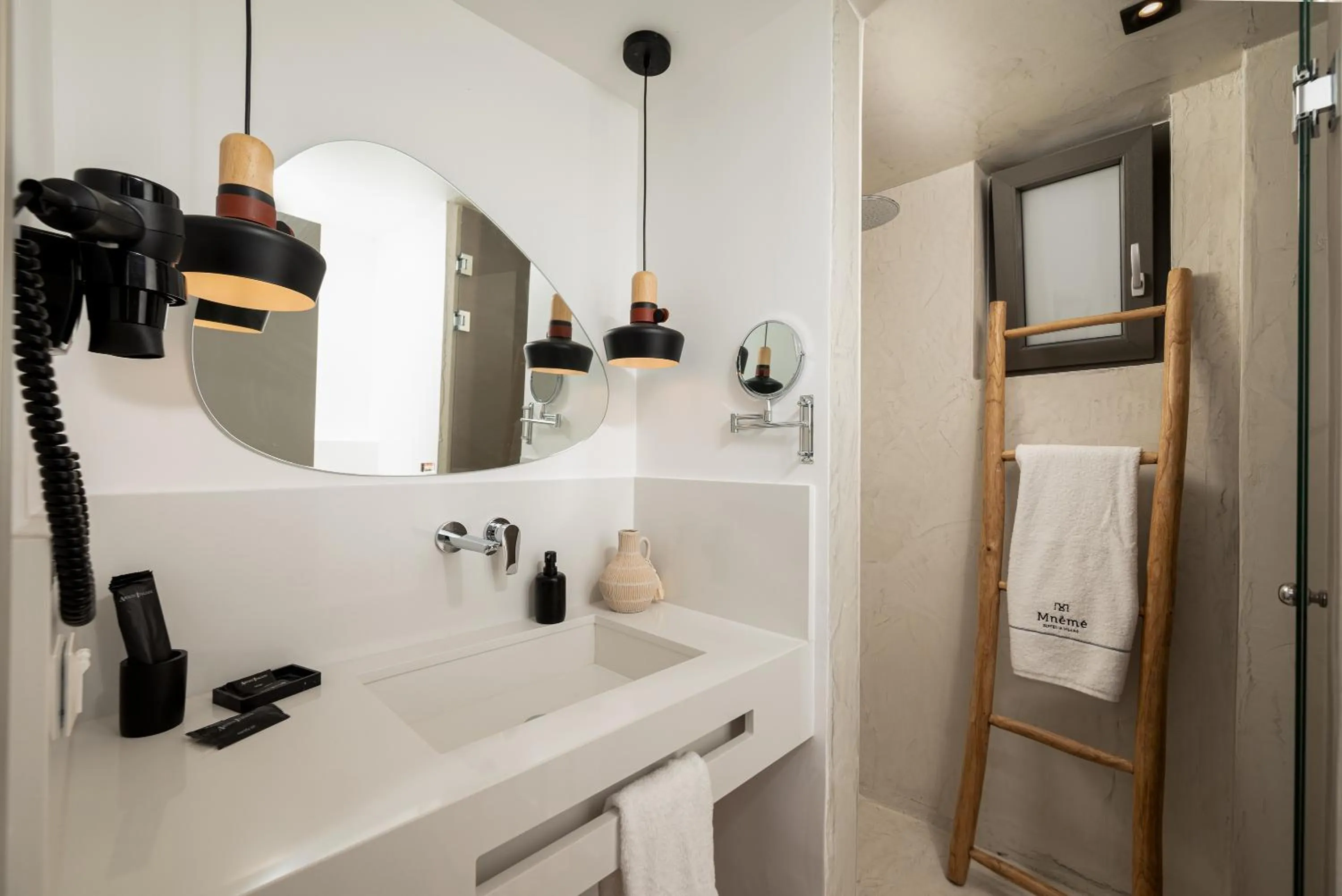 Shower in Mnḗmē Suites & Villas
