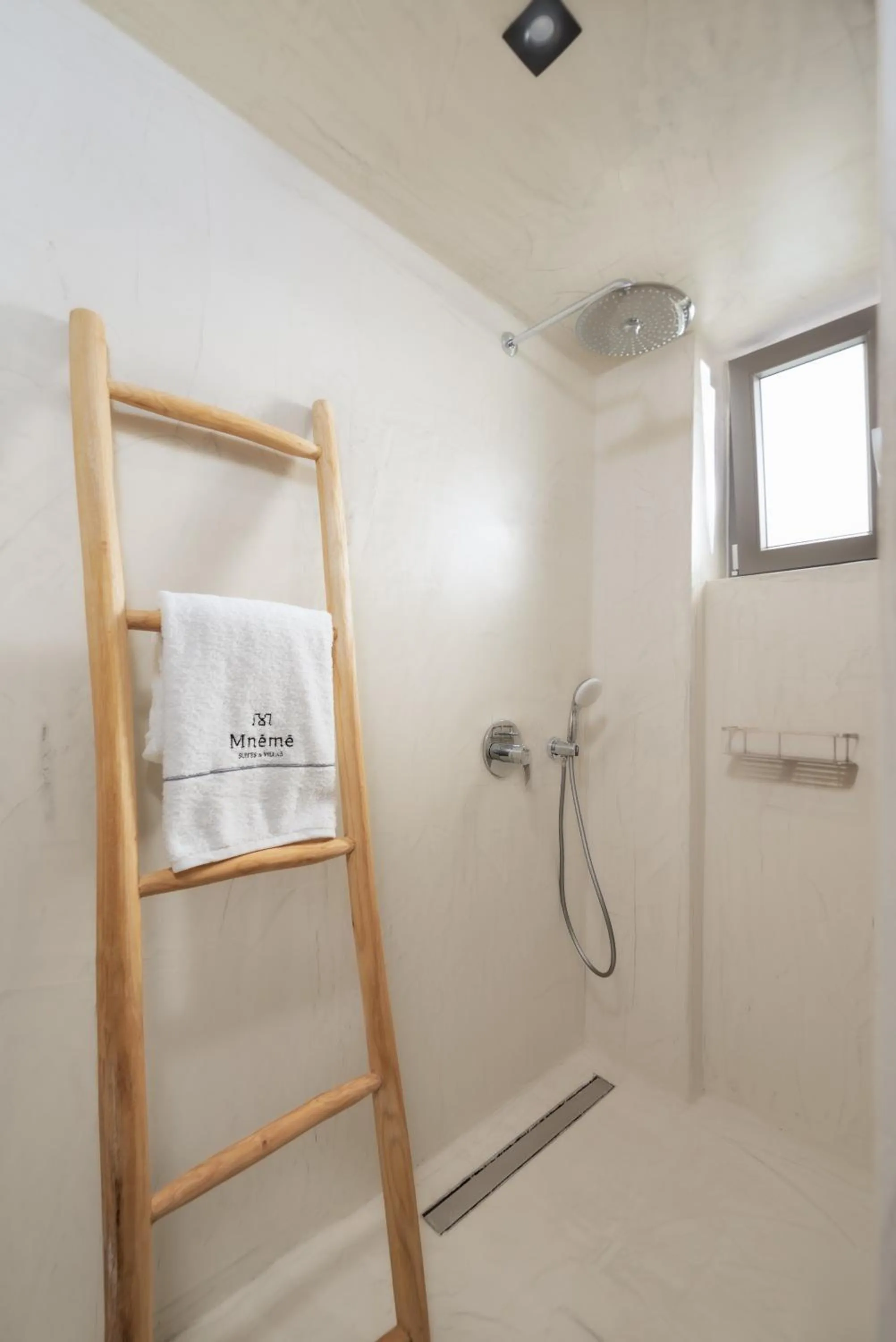 Shower in Mnḗmē Suites & Villas