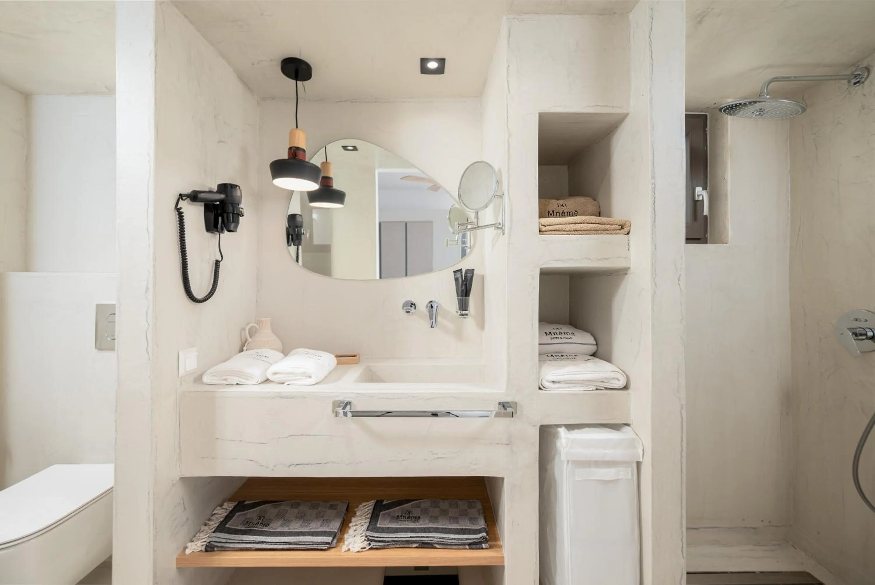 Bathroom in Mnḗmē Suites & Villas