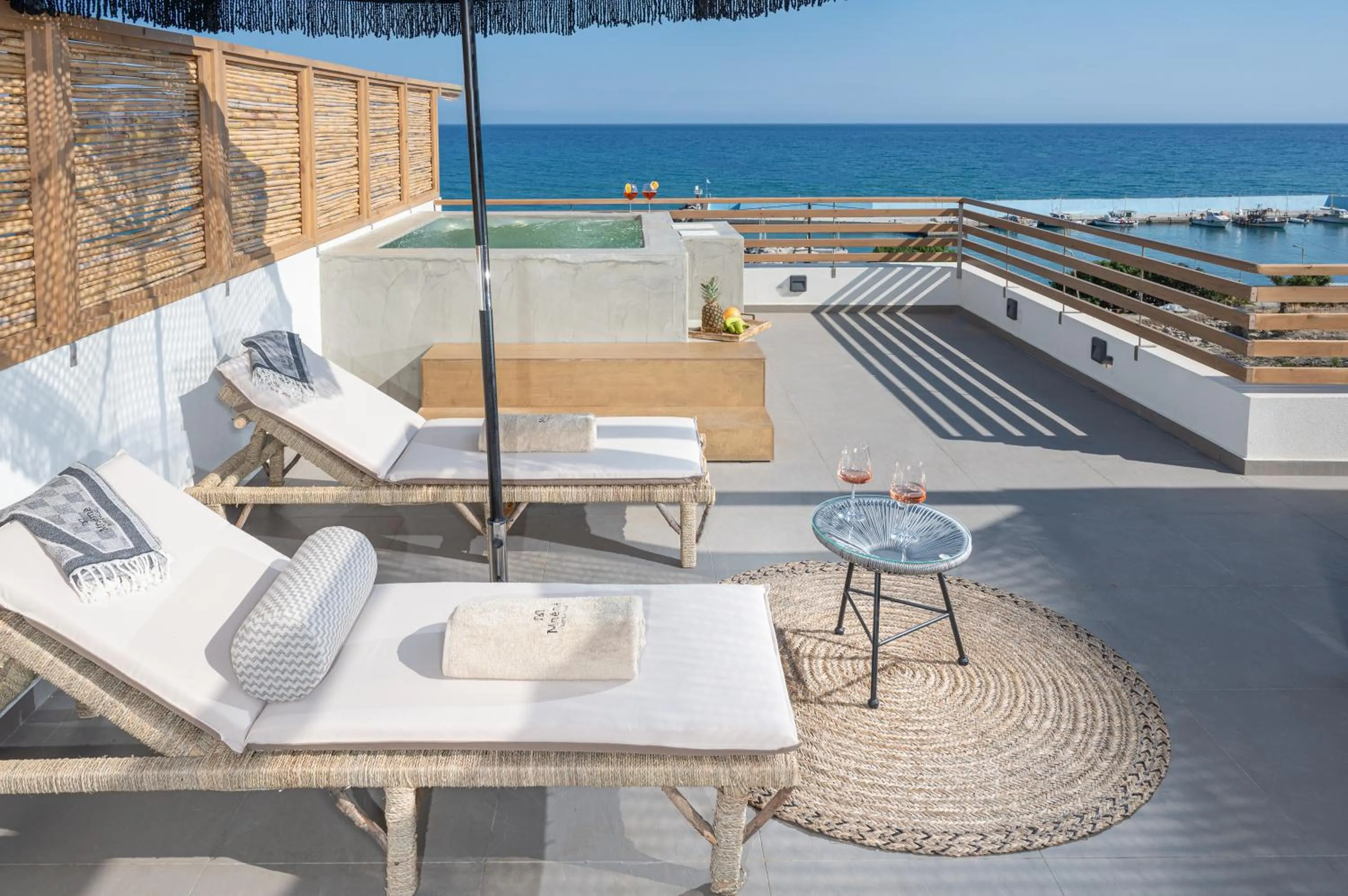 Patio in Mnḗmē Suites & Villas