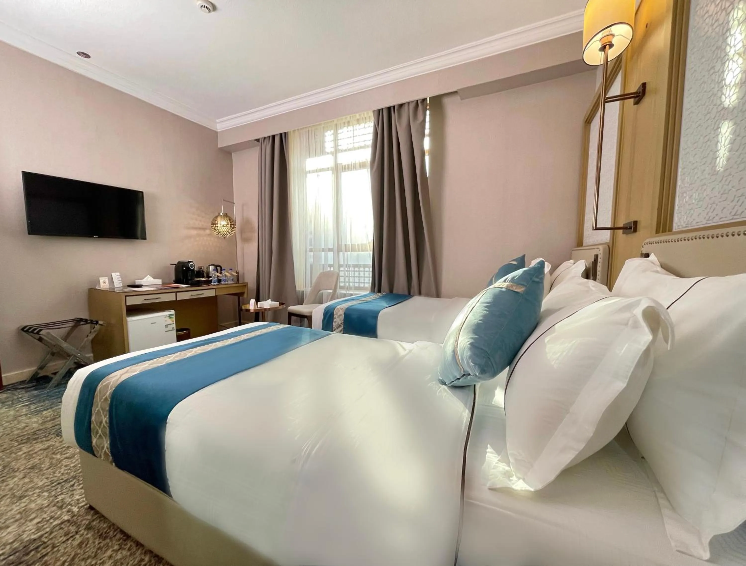 View (from property/room), Bed in Waqf Othman Bin Affan Hotel