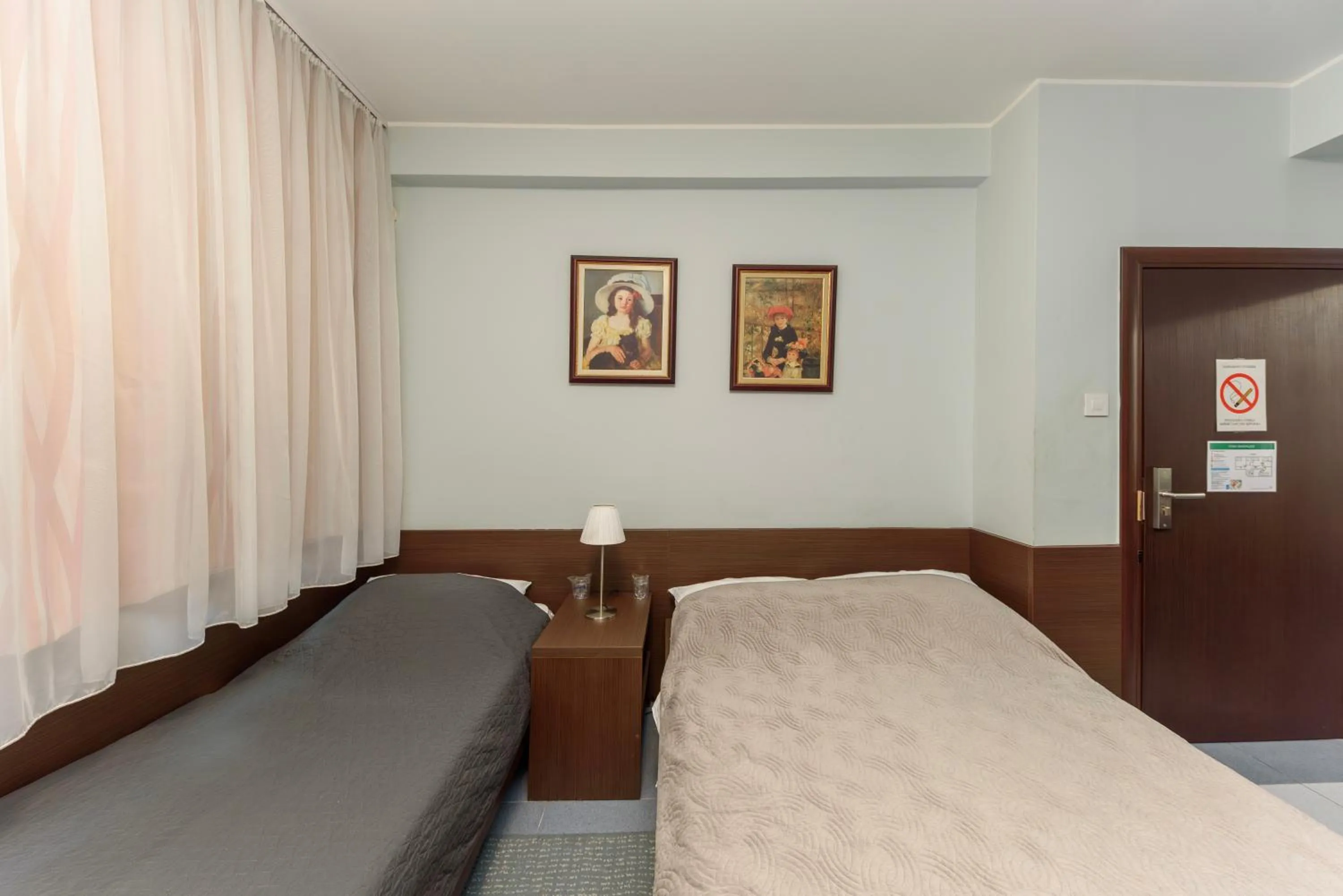 Bed in Garni Hotel Zenit