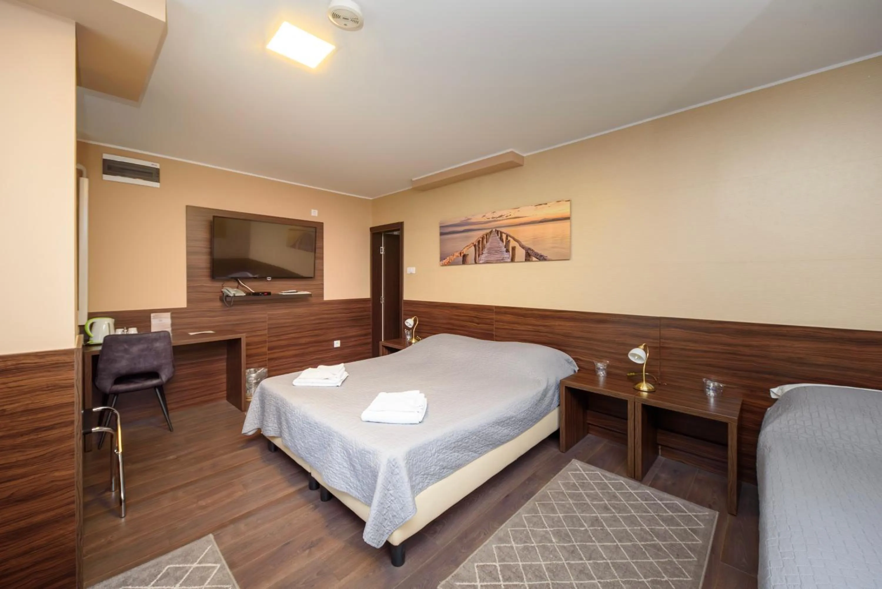 Bed in Garni Hotel Zenit