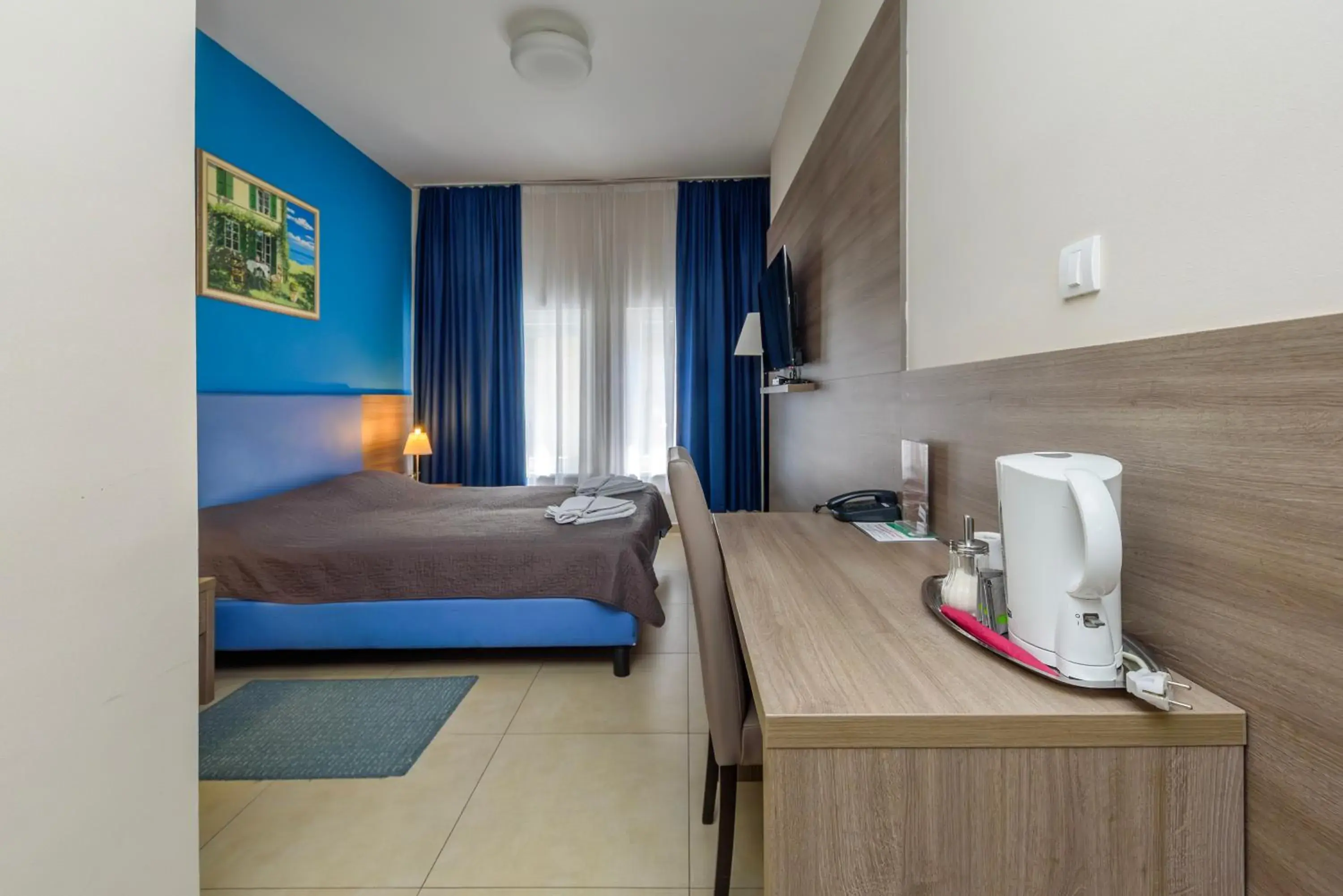 Bed in Garni Hotel Zenit Bed in Garni Hotel Zenit