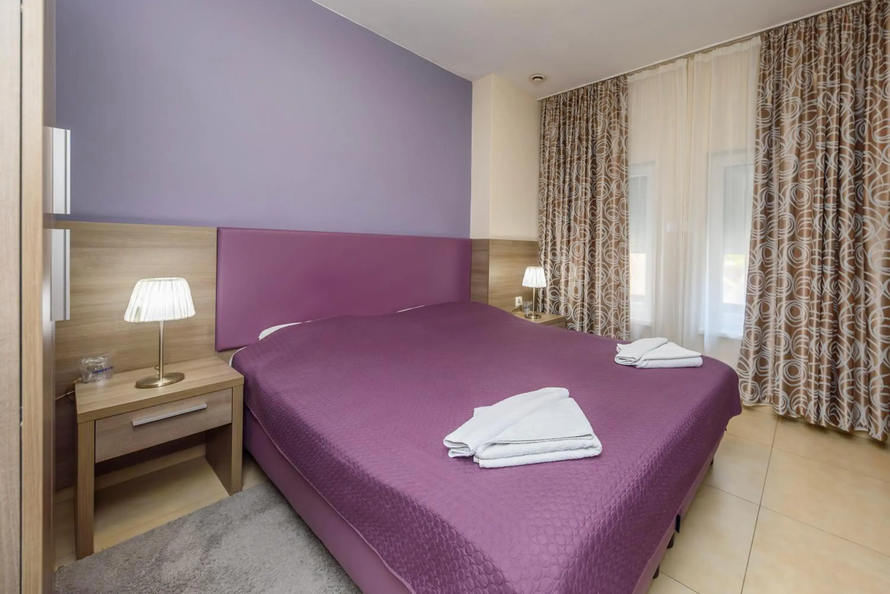 Bed in Garni Hotel Zenit Bed in Garni Hotel Zenit