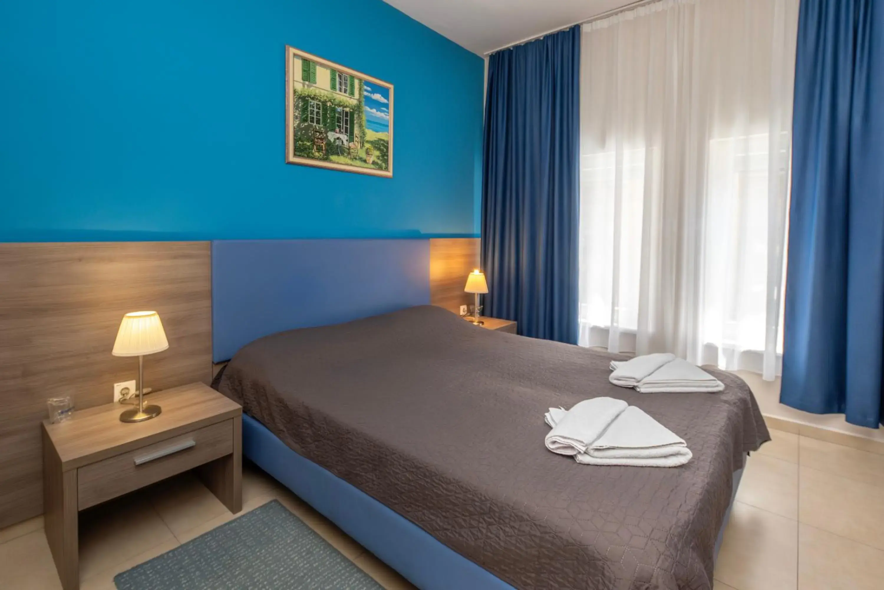 Bed in Garni Hotel Zenit Bed in Garni Hotel Zenit