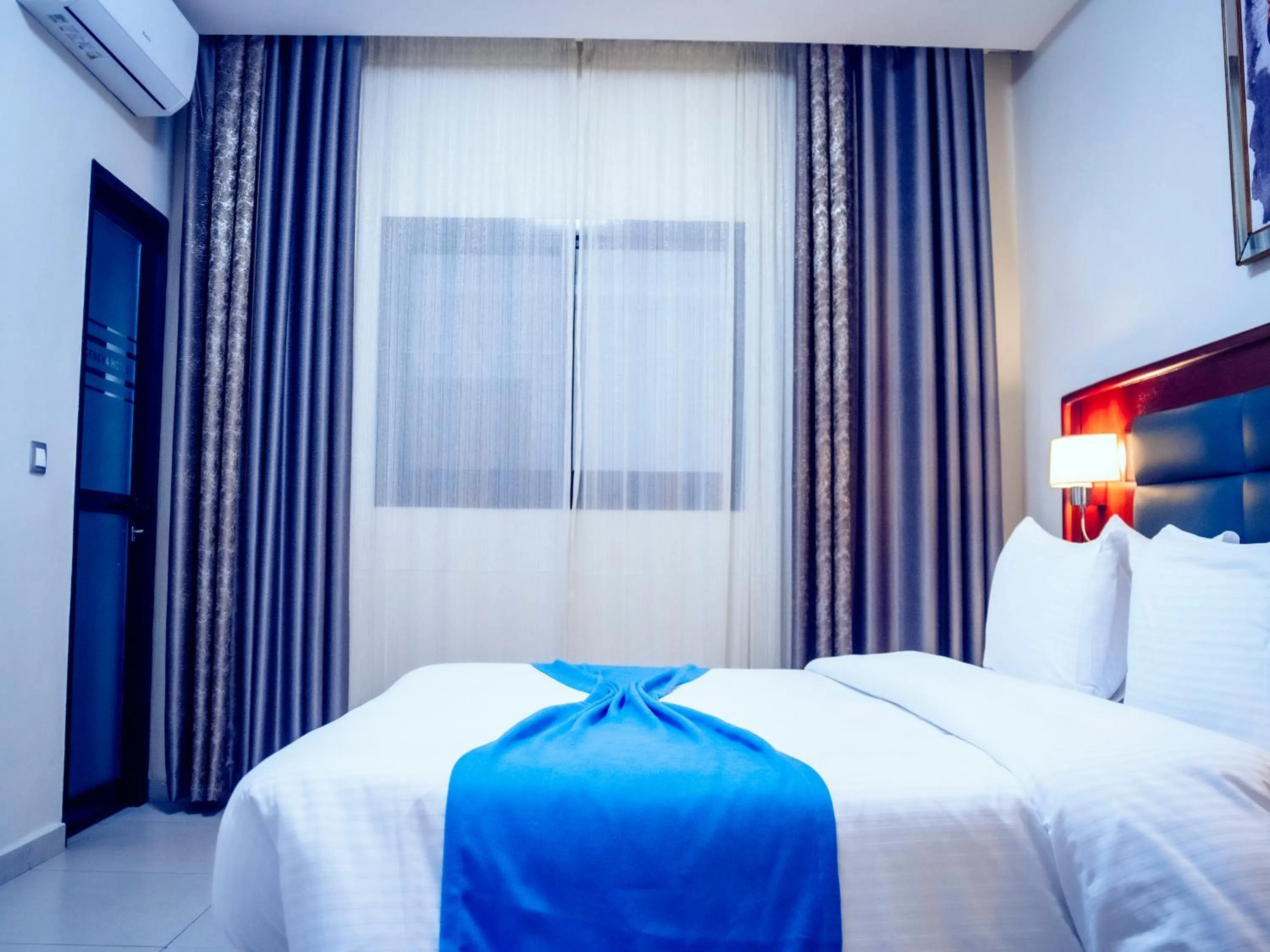 View (from property/room), Bed in Geneva Hotel