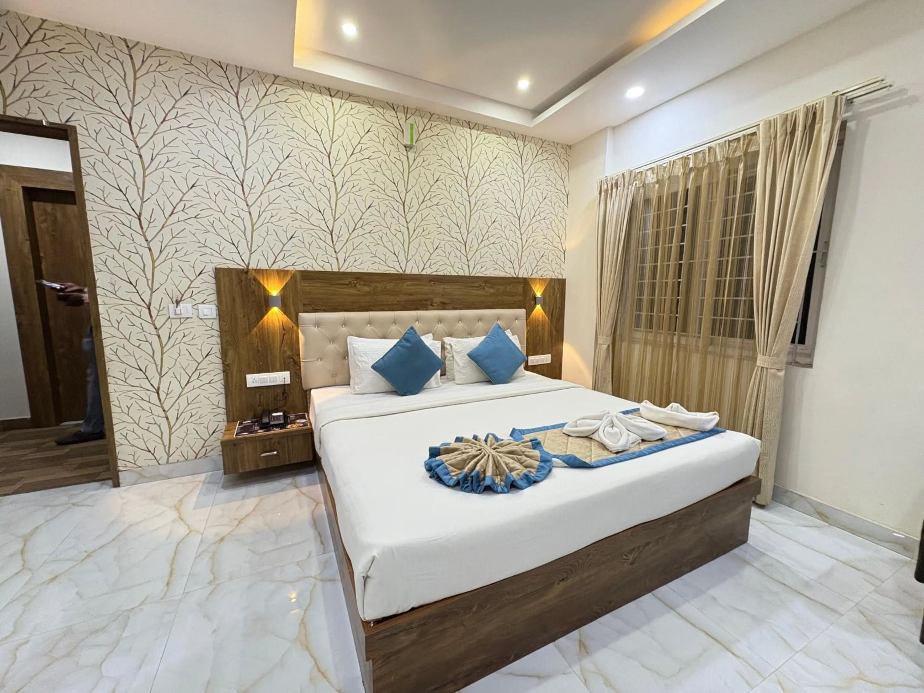 Bed in Spectra Hotel Bangalore Airport