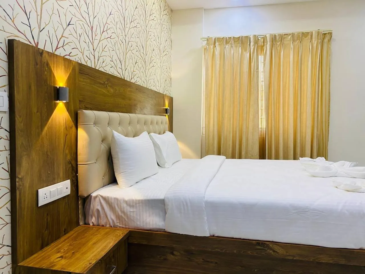 Bed in Spectra Hotel Bangalore Airport