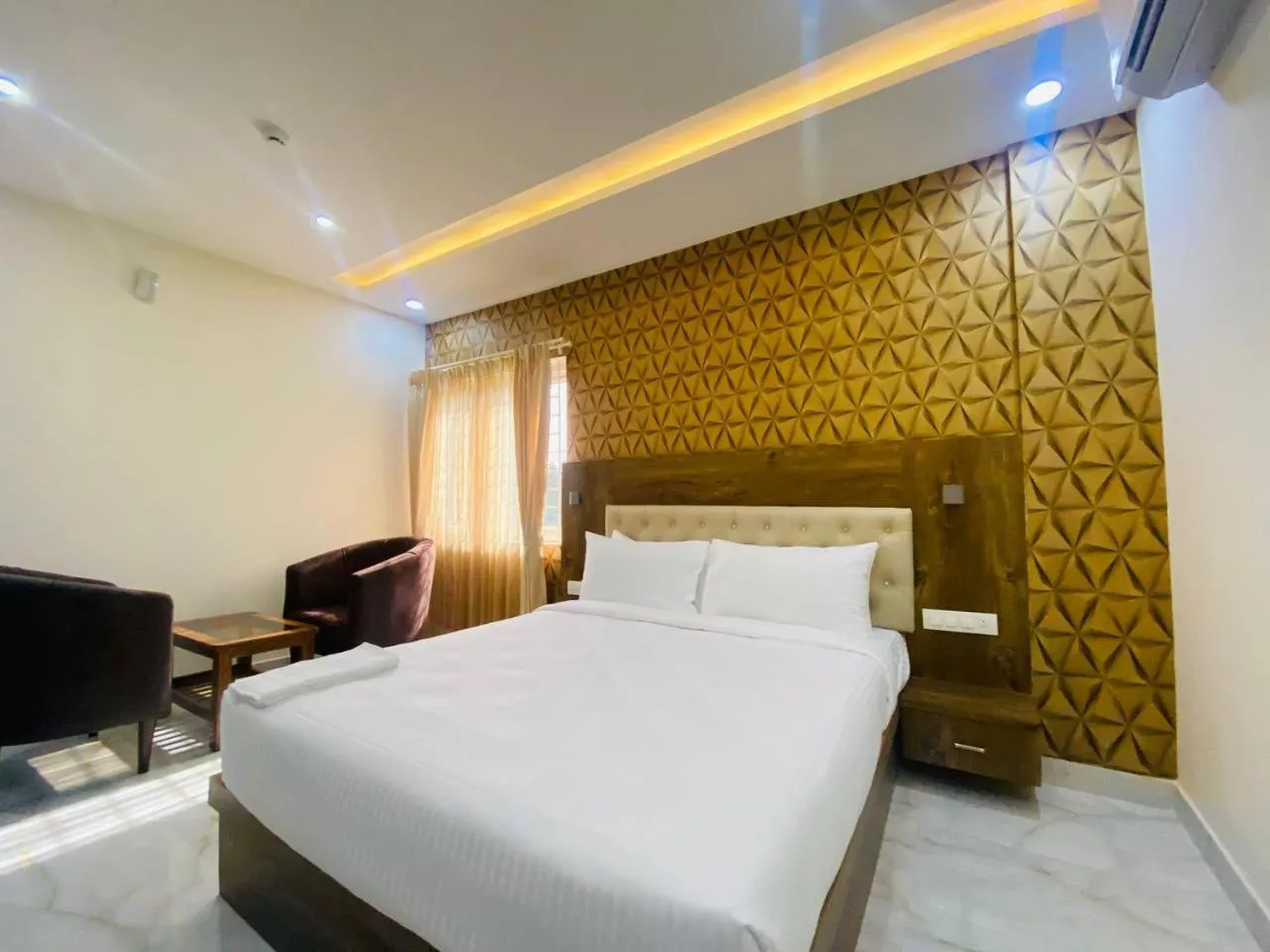 Bed in Spectra Hotel Bangalore Airport