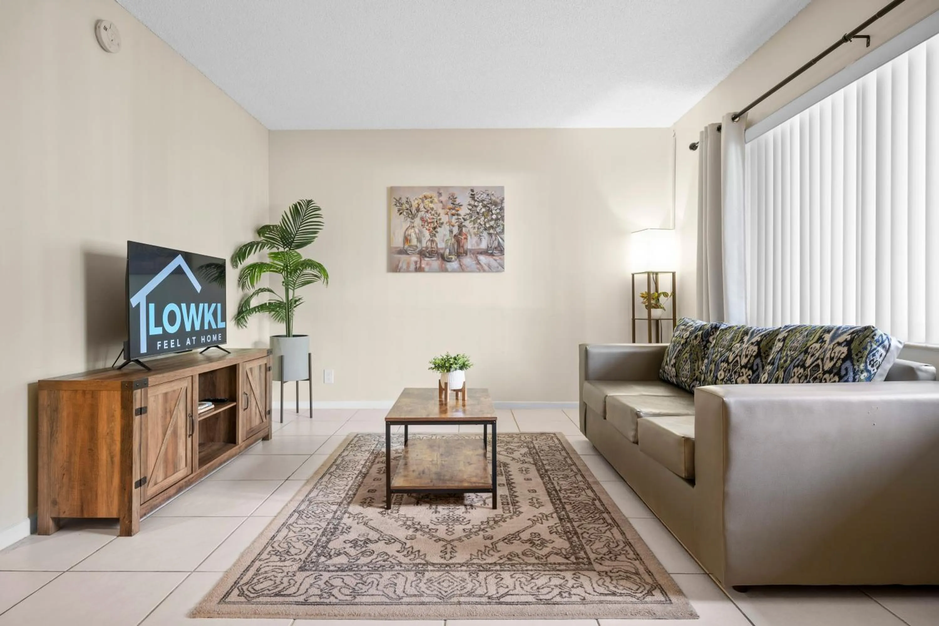 Living room in Coco Palms Apartments By Lowkl