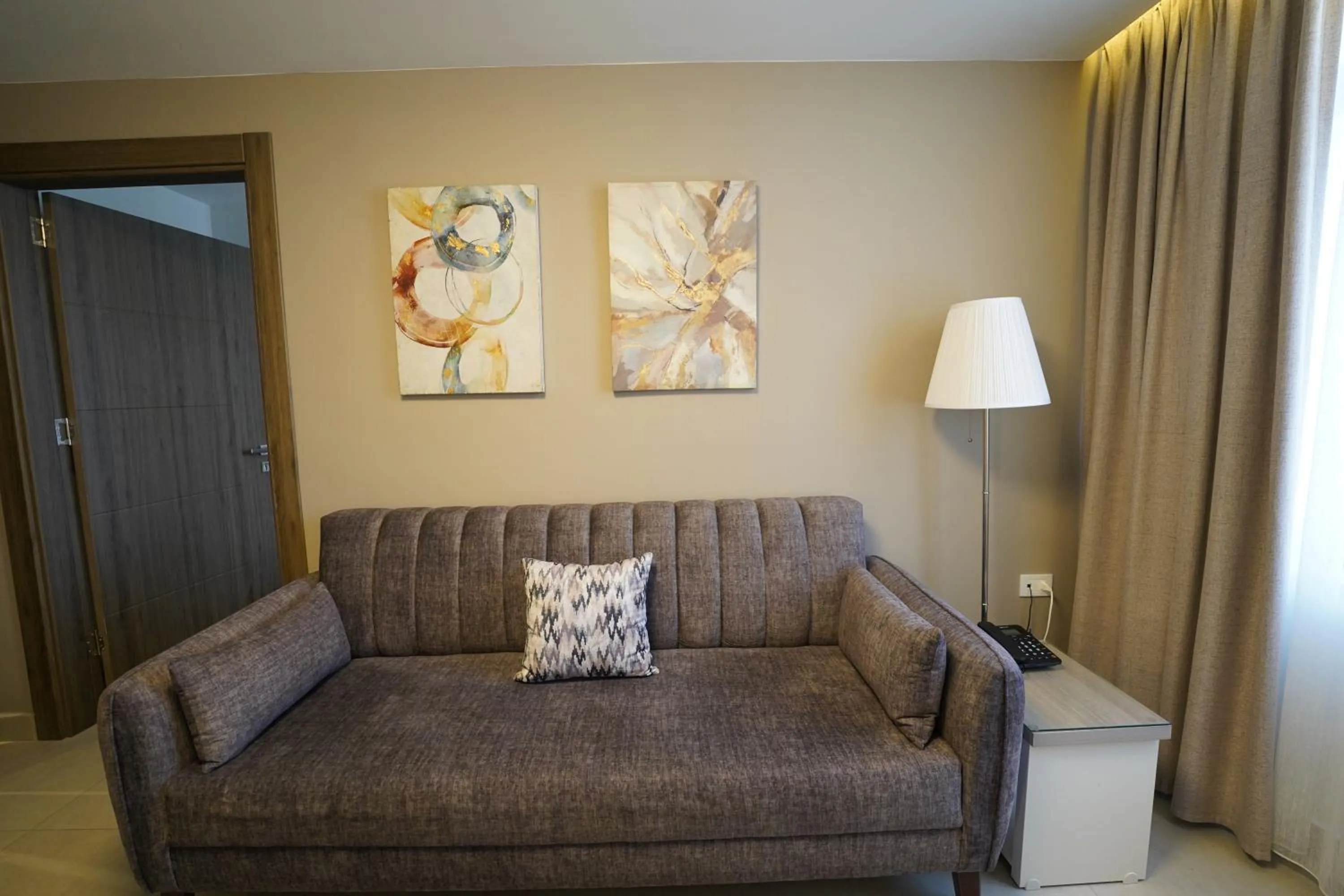 Living room in Red Carpet Hotel & Suites