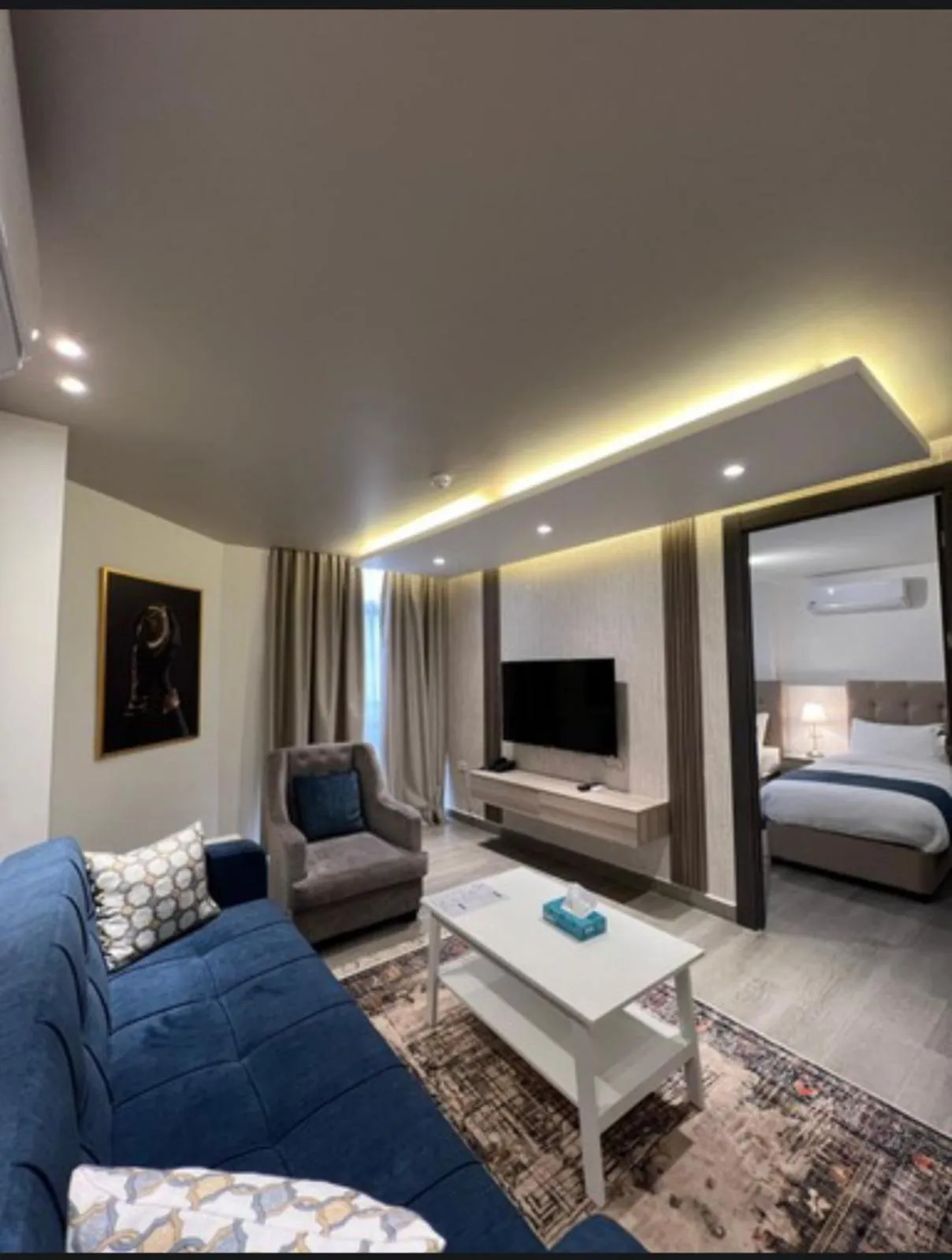 Bed in Red Carpet Hotel & Suites