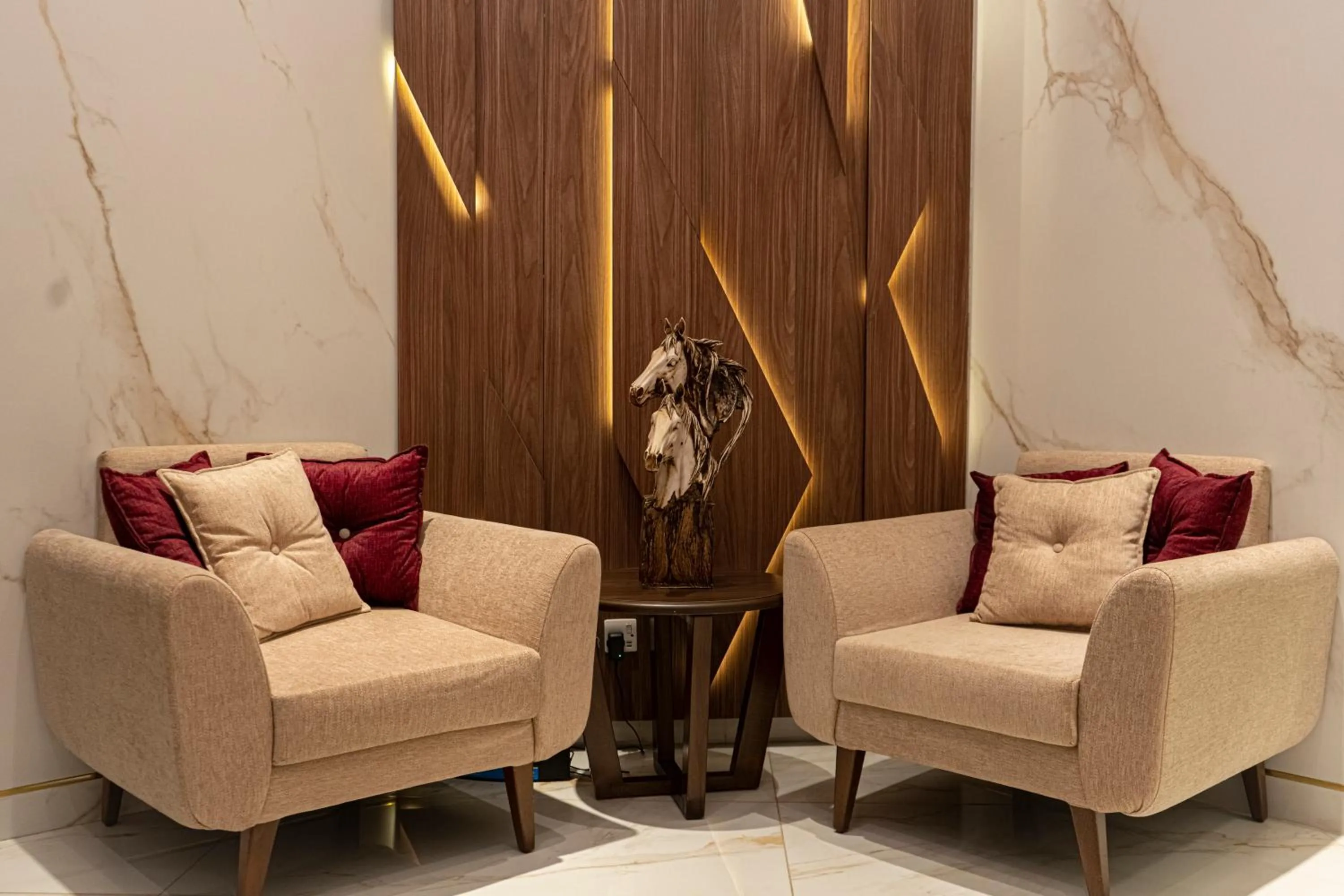 Seating area in Red Carpet Hotel & Suites