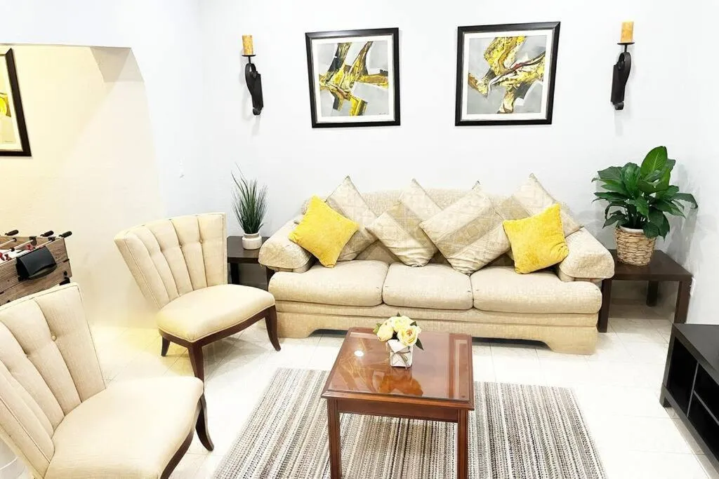 Living room in Amazing & cozy Duplex near Zoo Miami !