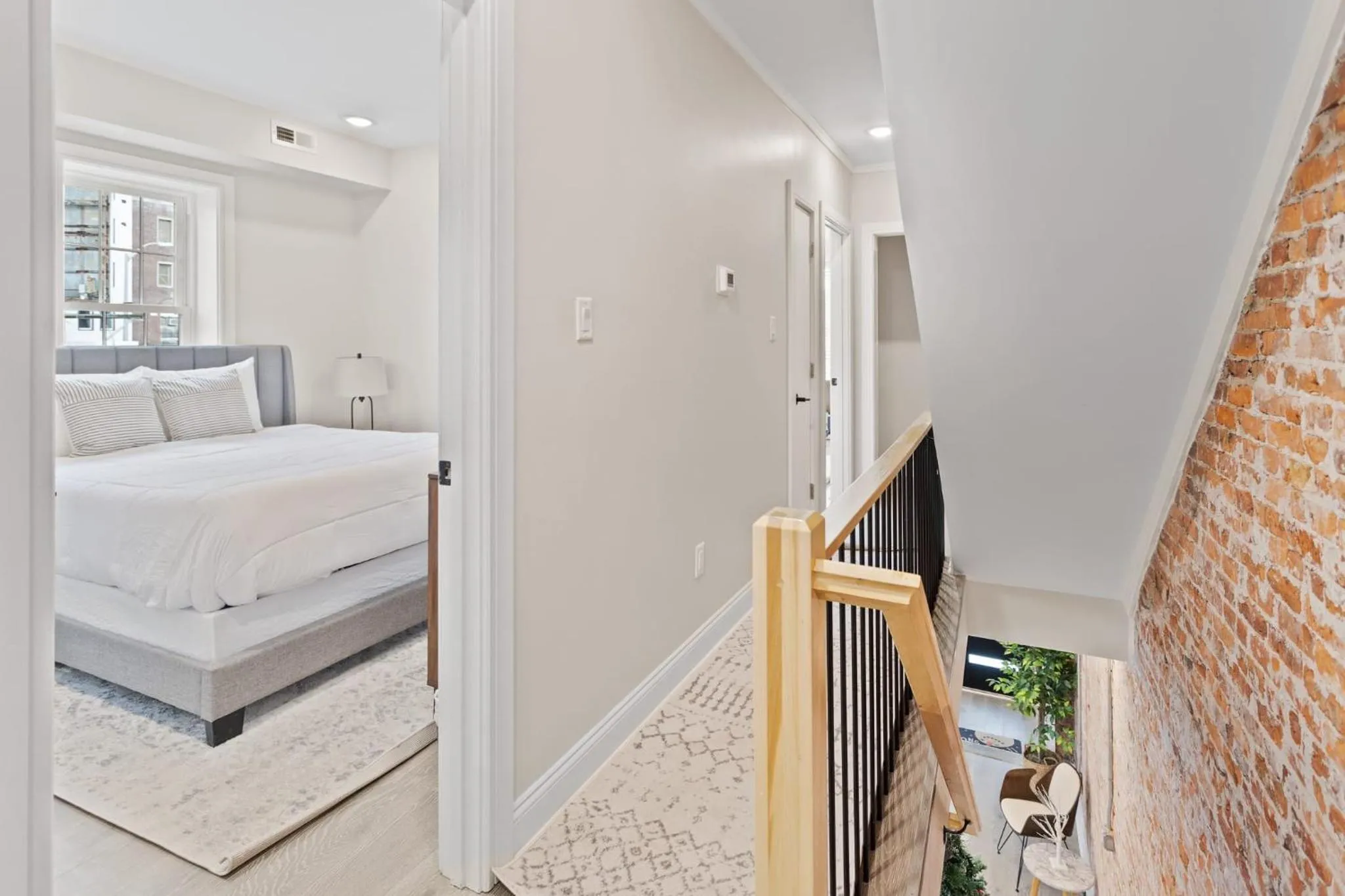 Bed in Loopin Around Atlantic City Luxe 5BR Townhouse in Orange Loop