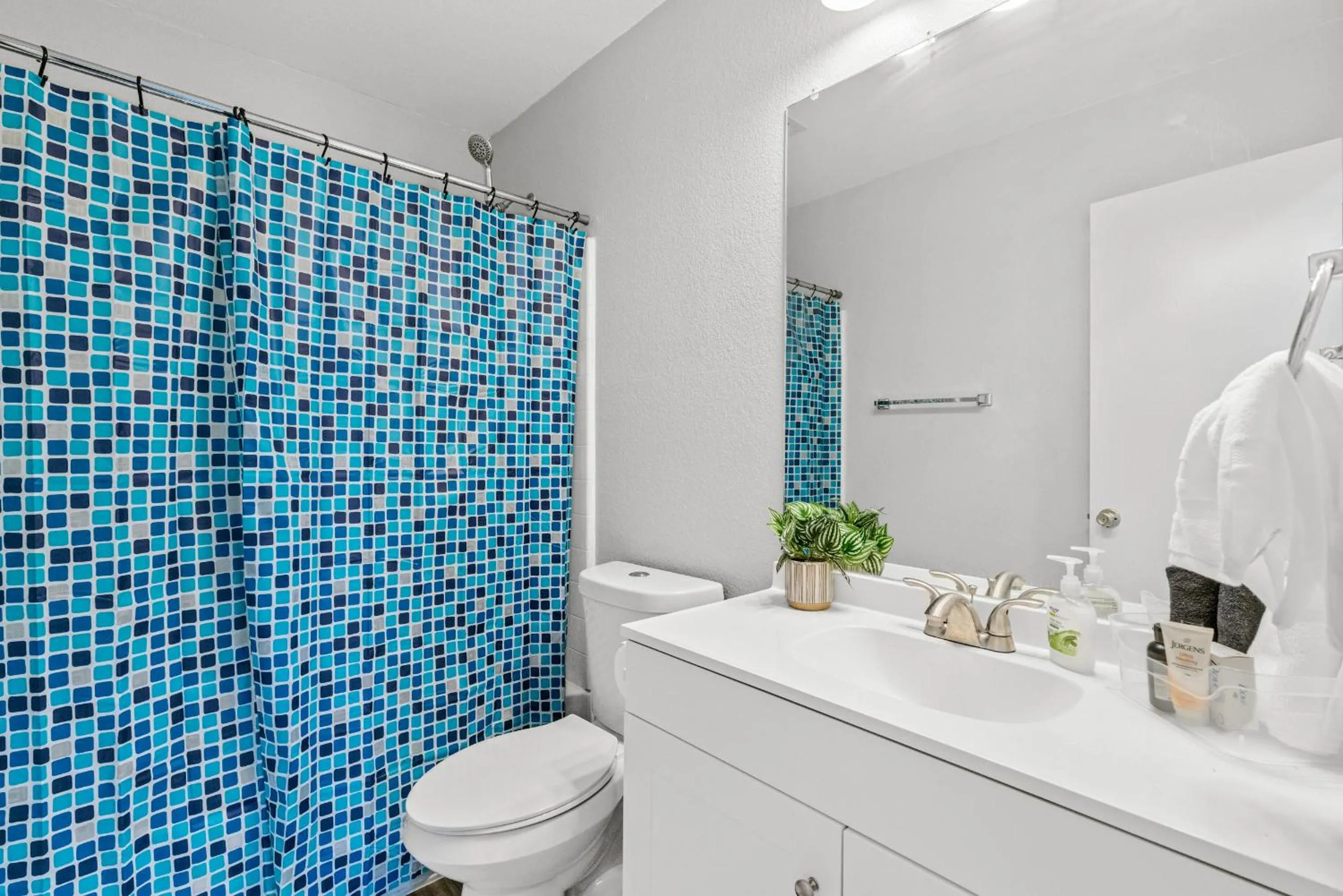 Bathroom in Modern, family friendly home w garage, huge yard!