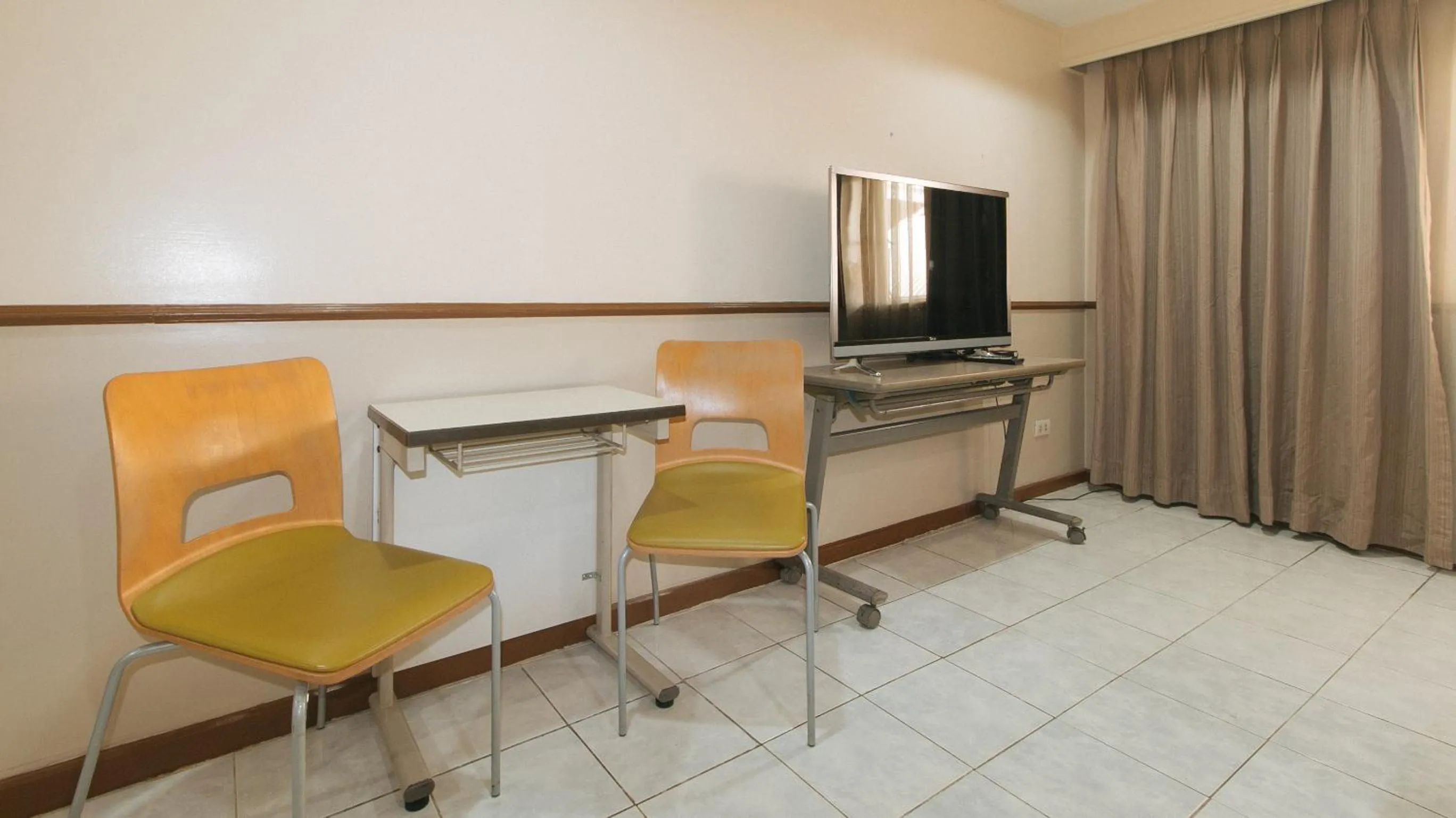 Seating area in Garden Plaza Hotel Manila