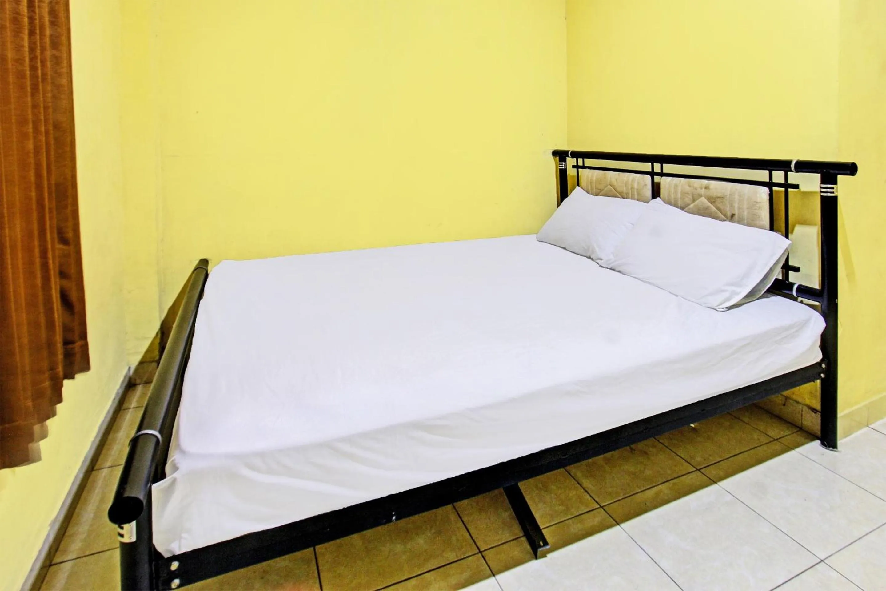 Bedroom, Bed in Hotel O Kos Agi Mataram Near Masjid Hissoh Al-Faham