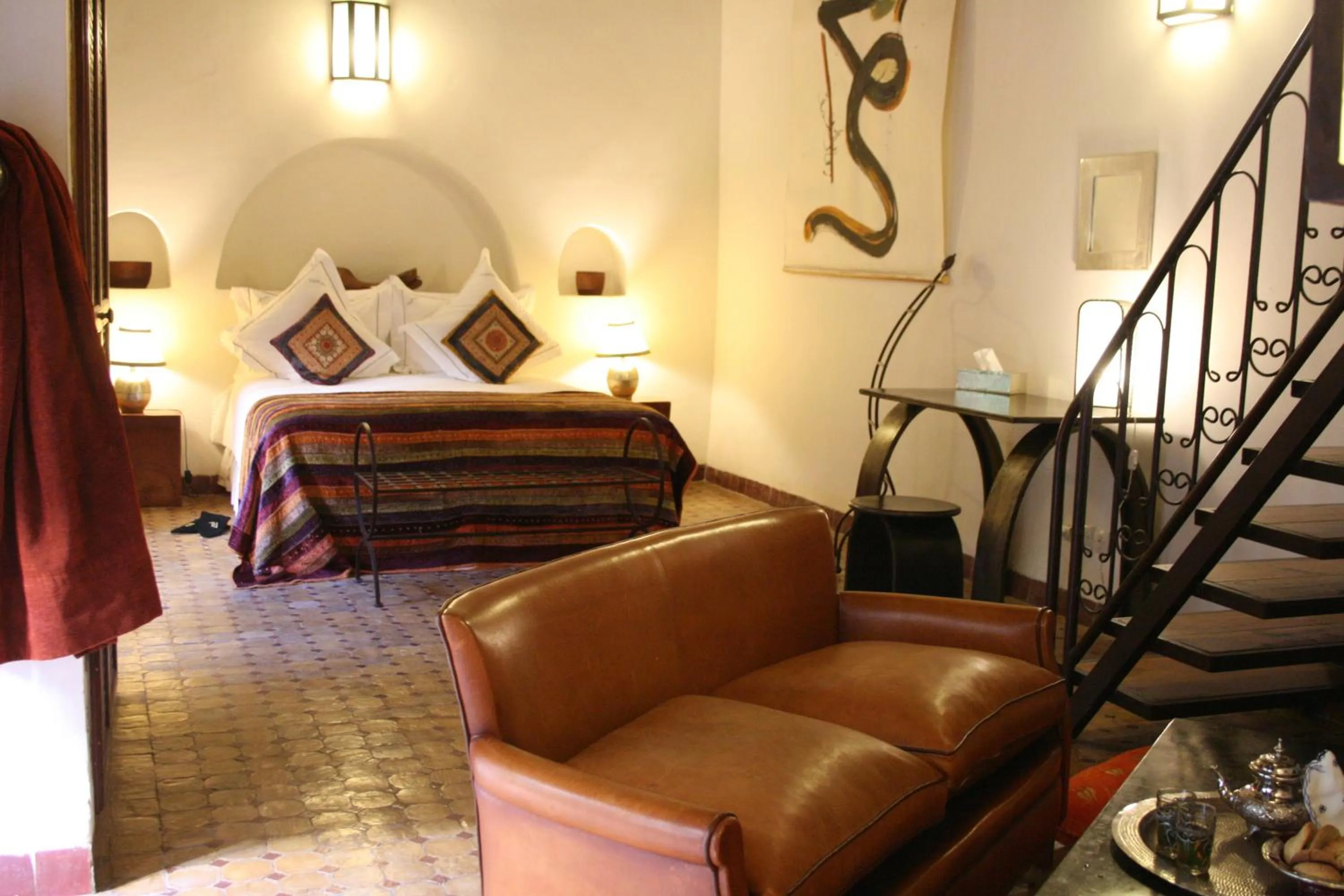 Photo of the whole room, Bed in Riad Laaroussa